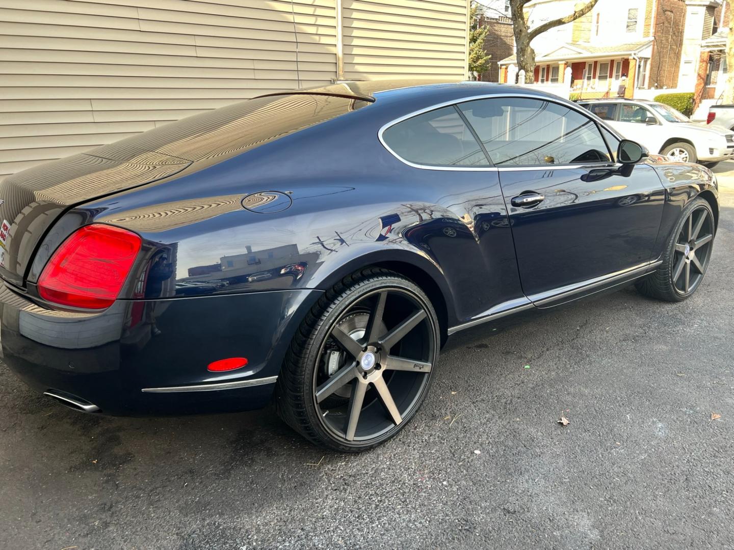 2004 Blue /TAN LEATHER Bentley Continental GT Coupe (SCBCR63W04C) with an 6.0L W12 DOHC 48V TURBO engine, 6-Speed Automatic Overdrive transmission, located at 1018 Brunswick Ave, Trenton, NJ, 08638, (609) 989-0900, 40.240086, -74.748085 - Photo#2