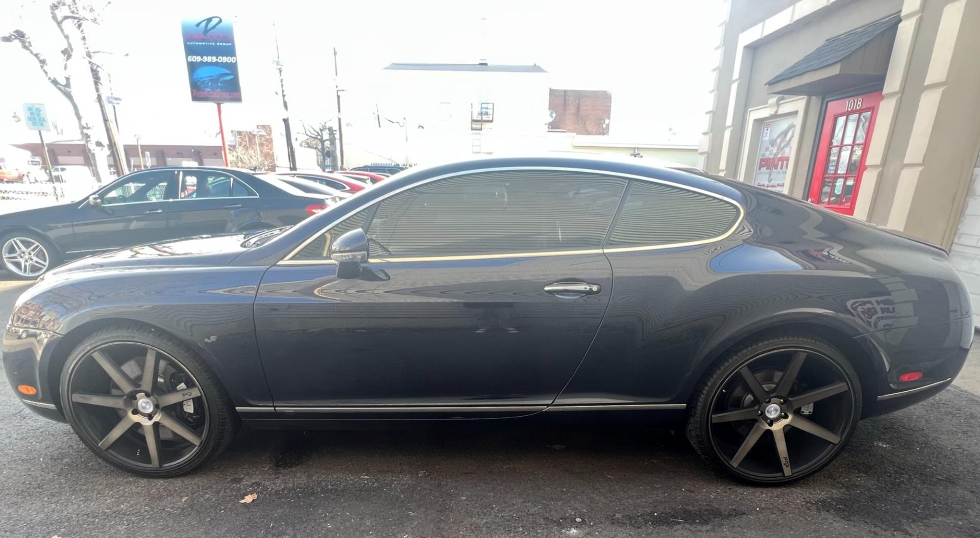 2004 Blue /TAN LEATHER Bentley Continental GT Coupe (SCBCR63W04C) with an 6.0L W12 DOHC 48V TURBO engine, 6-Speed Automatic Overdrive transmission, located at 1018 Brunswick Ave, Trenton, NJ, 08638, (609) 989-0900, 40.240086, -74.748085 - Photo#4