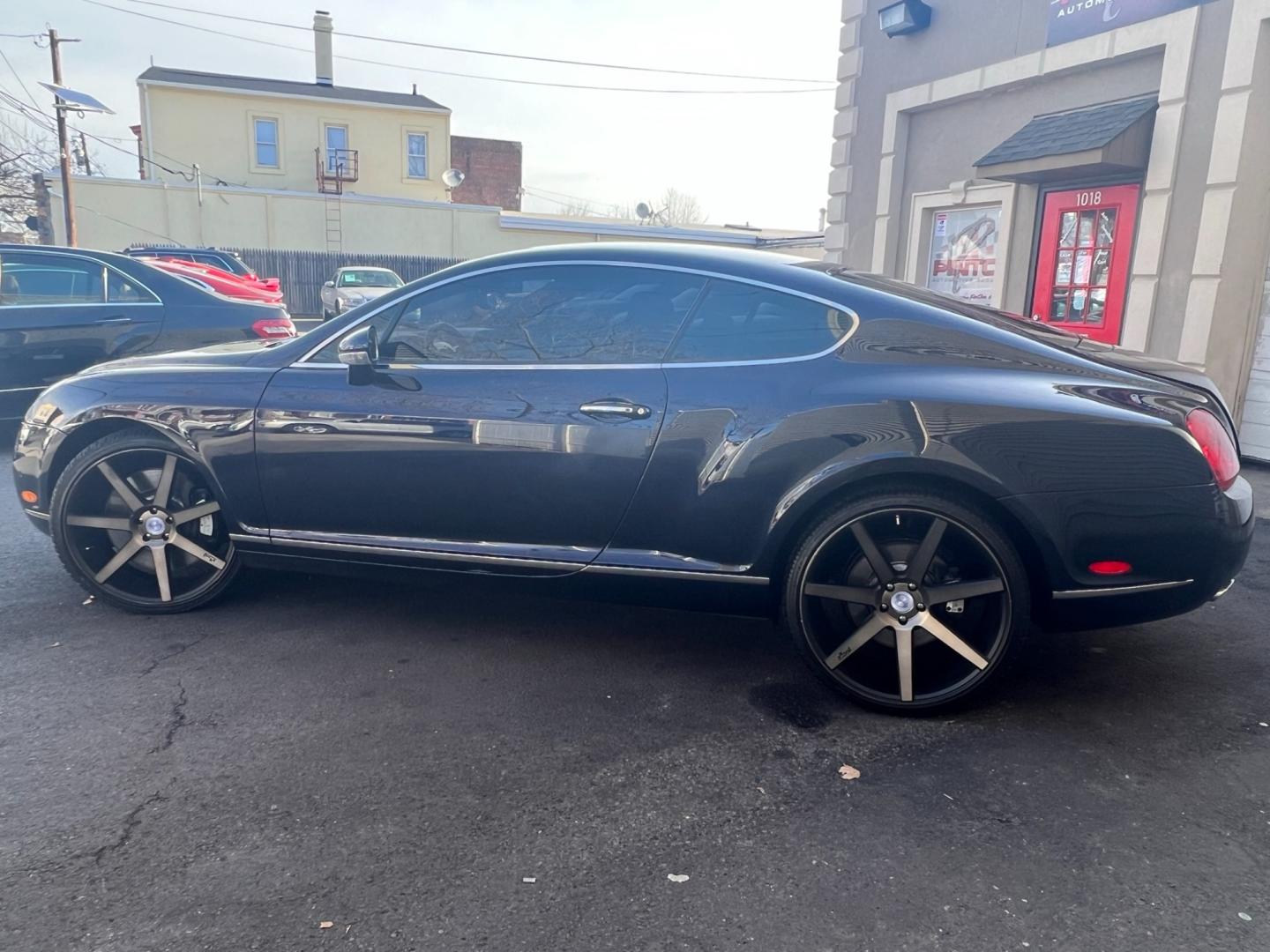 2004 Blue /TAN LEATHER Bentley Continental GT Coupe (SCBCR63W04C) with an 6.0L W12 DOHC 48V TURBO engine, 6-Speed Automatic Overdrive transmission, located at 1018 Brunswick Ave, Trenton, NJ, 08638, (609) 989-0900, 40.240086, -74.748085 - Photo#6