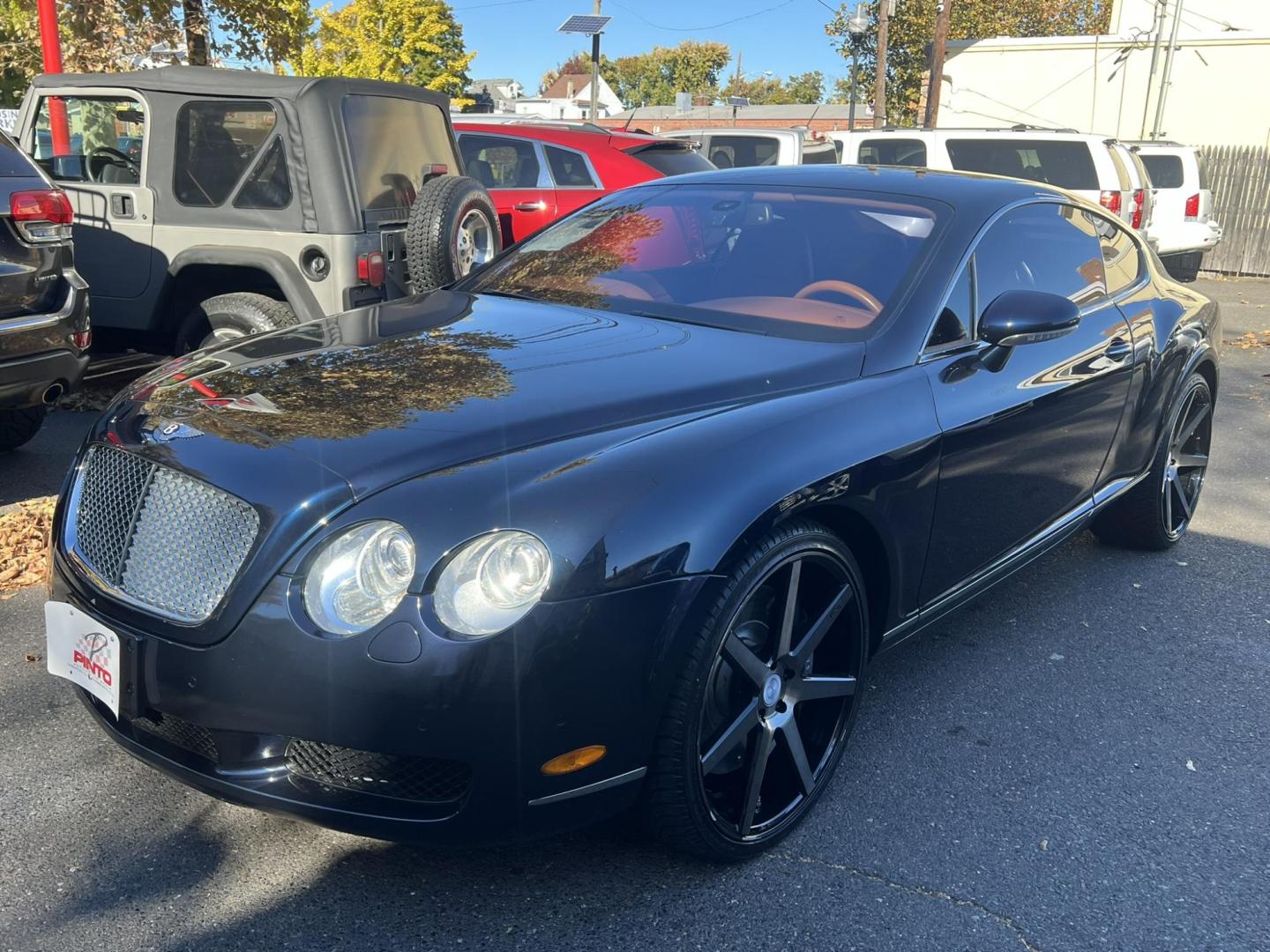 2004 Blue /TAN LEATHER Bentley Continental GT Coupe (SCBCR63W04C) with an 6.0L W12 DOHC 48V TURBO engine, 6-Speed Automatic Overdrive transmission, located at 1018 Brunswick Ave, Trenton, NJ, 08638, (609) 989-0900, 40.240086, -74.748085 - Holy Cow! This Bentley is stunning in every way and has only 38k Original Miles! Fully Serviced and Perfect Automobile. Brand New 22" Custom wheels! This vehicle was approx. $190k brand new! An incredible Value for this absolutely beautiful Bentley! Call Anthony to set up an appointment to come see - Photo#0