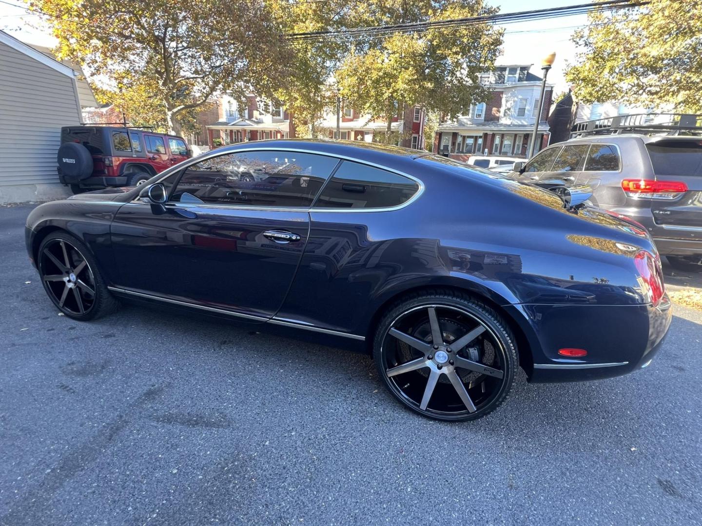 2004 Blue /TAN LEATHER Bentley Continental GT Coupe (SCBCR63W04C) with an 6.0L W12 DOHC 48V TURBO engine, 6-Speed Automatic Overdrive transmission, located at 1018 Brunswick Ave, Trenton, NJ, 08638, (609) 989-0900, 40.240086, -74.748085 - Holy Cow! This Bentley is stunning in every way and has only 38k Original Miles! Fully Serviced and Perfect Automobile. Brand New 22" Custom wheels! This vehicle was approx. $190k brand new! An incredible Value for this absolutely beautiful Bentley! Call Anthony to set up an appointment to come see - Photo#4