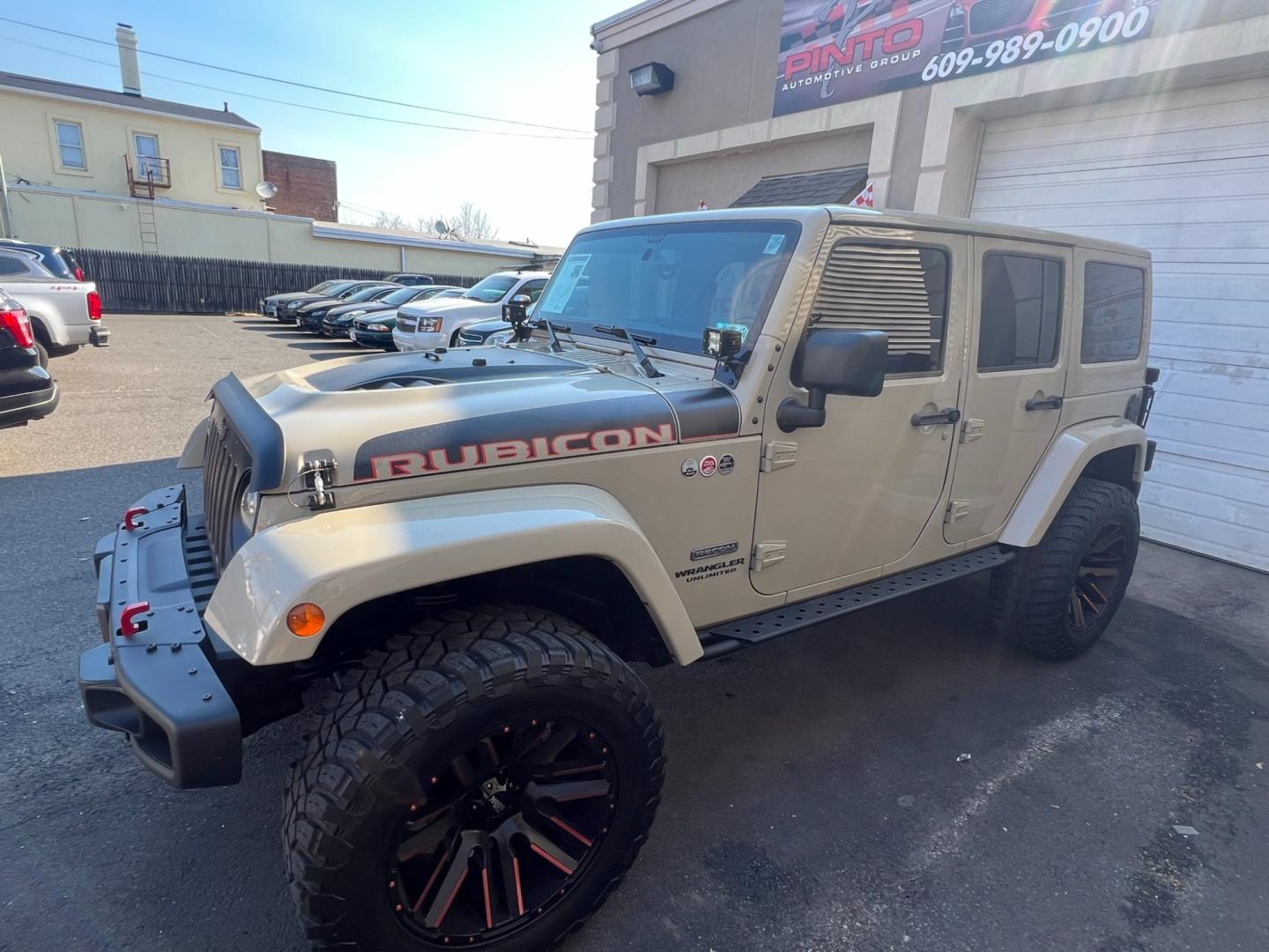 2017 Beige /Black Leather Jeep Wrangler Unlimited Rubicon (1C4HJWFG5HL) with an 3.6L V6 DOHC 24V FFV engine, located at 1018 Brunswick Ave, Trenton, NJ, 08638, (609) 989-0900, 40.240086, -74.748085 - Photo#0