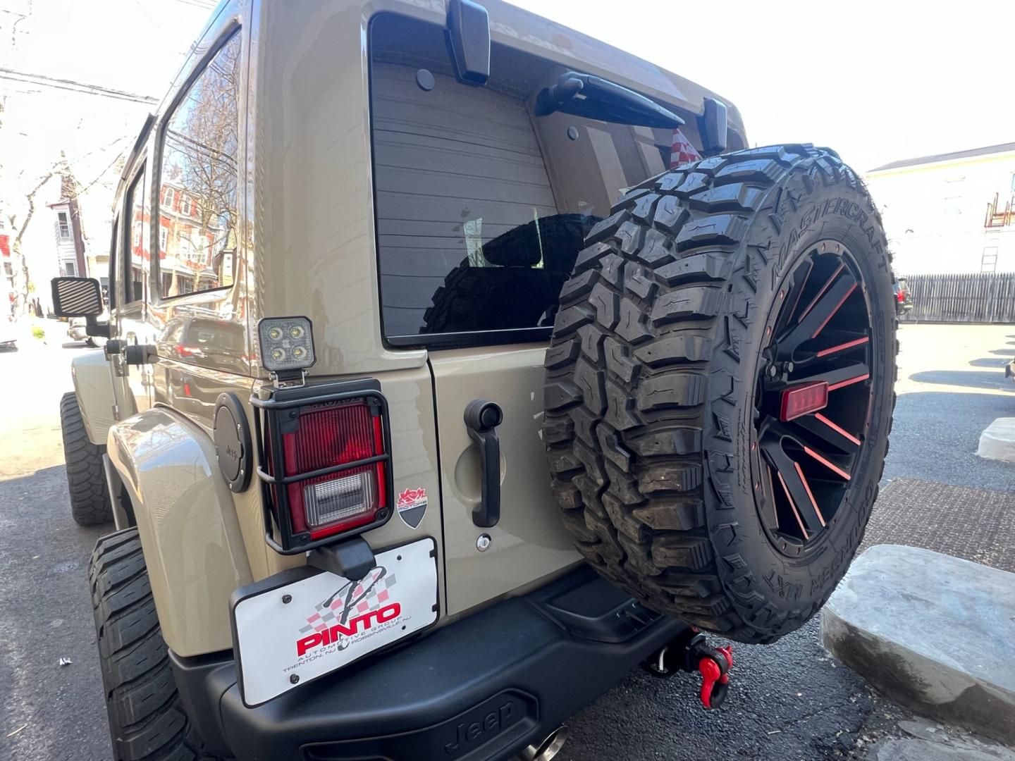 2017 Beige /Black Leather Jeep Wrangler Unlimited Rubicon (1C4HJWFG5HL) with an 3.6L V6 DOHC 24V FFV engine, located at 1018 Brunswick Ave, Trenton, NJ, 08638, (609) 989-0900, 40.240086, -74.748085 - Photo#28