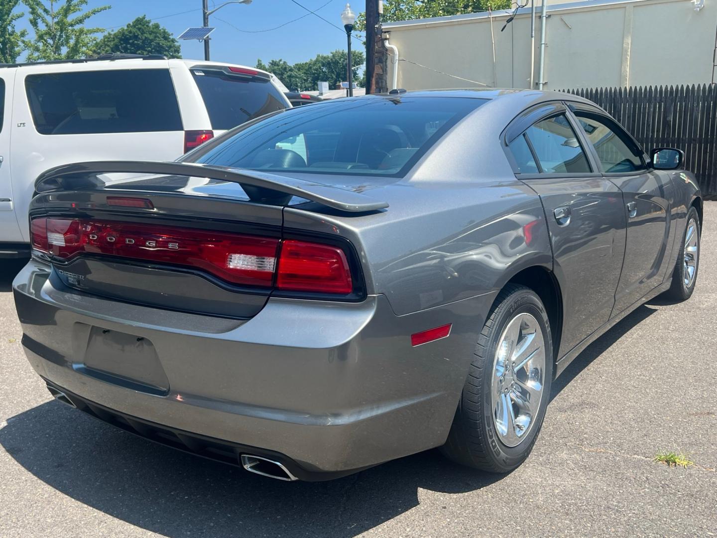 2012 GRAY /Black Leather Dodge Charger SXT (2C3CDXHG4CH) with an 3.6L V6 DOHC 24V engine, 5 Speed Automatic transmission, located at 1018 Brunswick Ave, Trenton, NJ, 08638, (609) 989-0900, 40.240086, -74.748085 - Photo#1