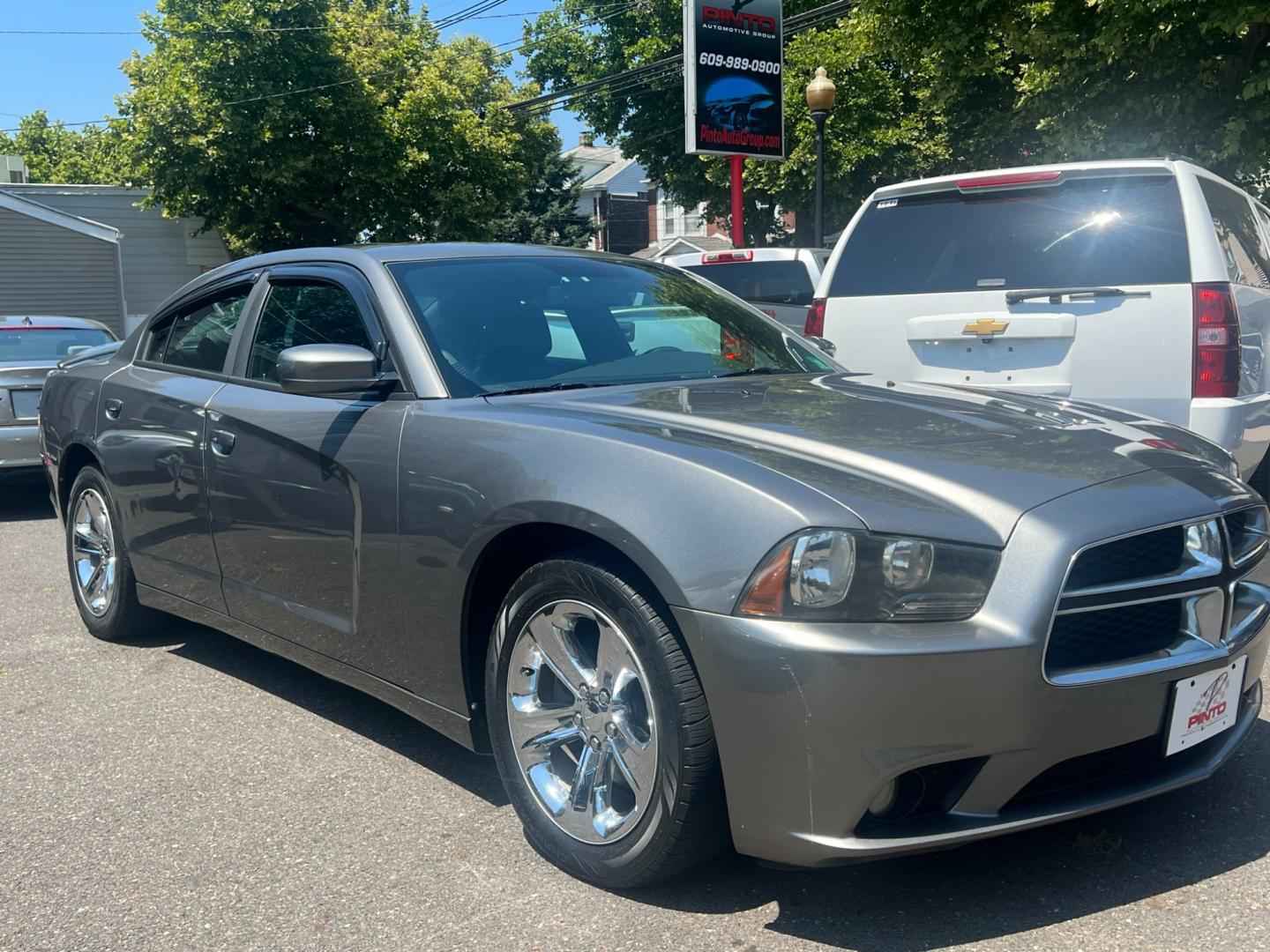 2012 GRAY /Black Leather Dodge Charger SXT (2C3CDXHG4CH) with an 3.6L V6 DOHC 24V engine, 5 Speed Automatic transmission, located at 1018 Brunswick Ave, Trenton, NJ, 08638, (609) 989-0900, 40.240086, -74.748085 - Photo#3