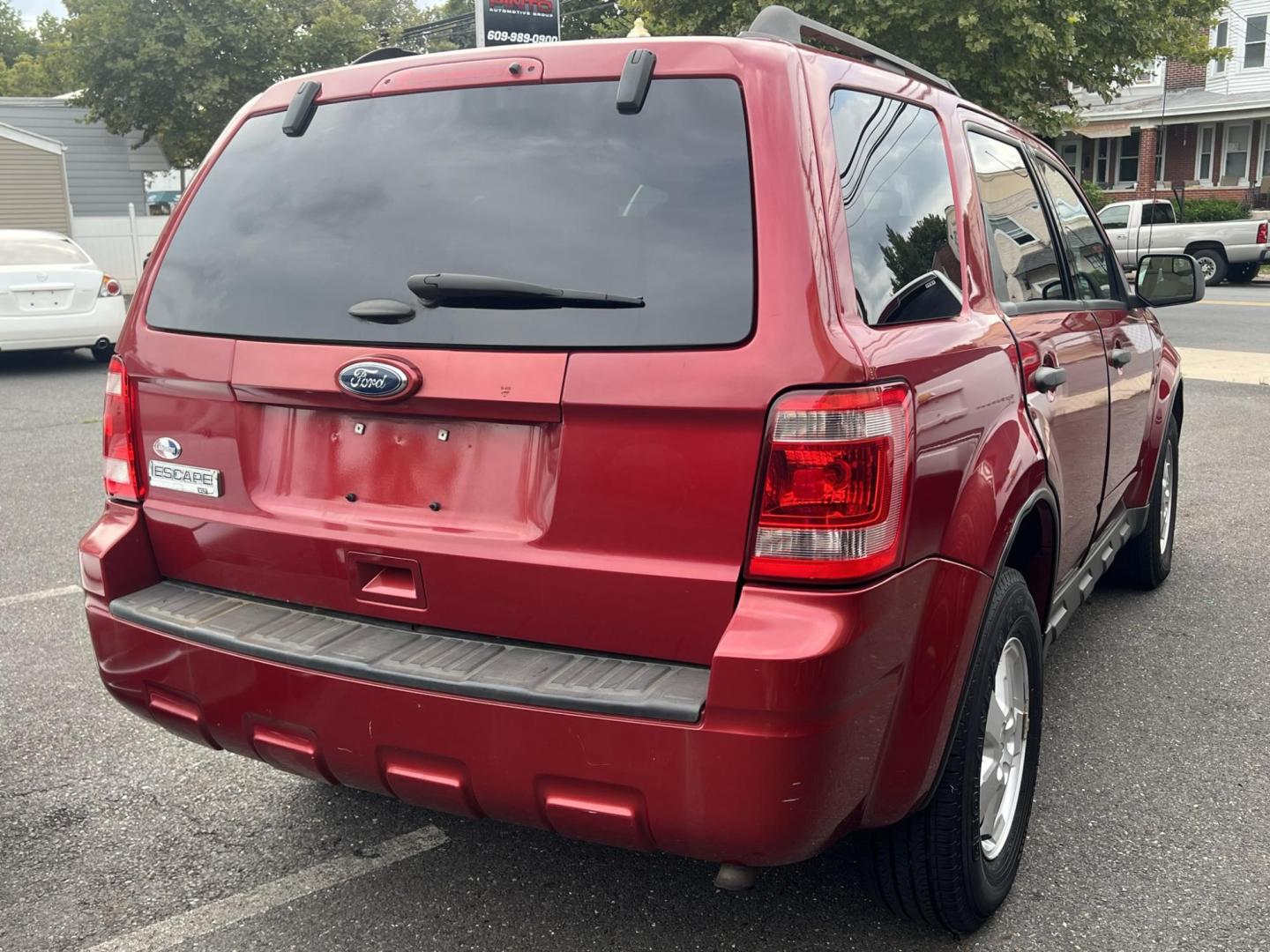 2012 Red /Gray Ford Escape XLT FWD (1FMCU0D73CK) with an 2.5L L4 DOHC 16V engine, 6-Speed Automatic transmission, located at 1018 Brunswick Ave, Trenton, NJ, 08638, (609) 989-0900, 40.240086, -74.748085 - Photo#4