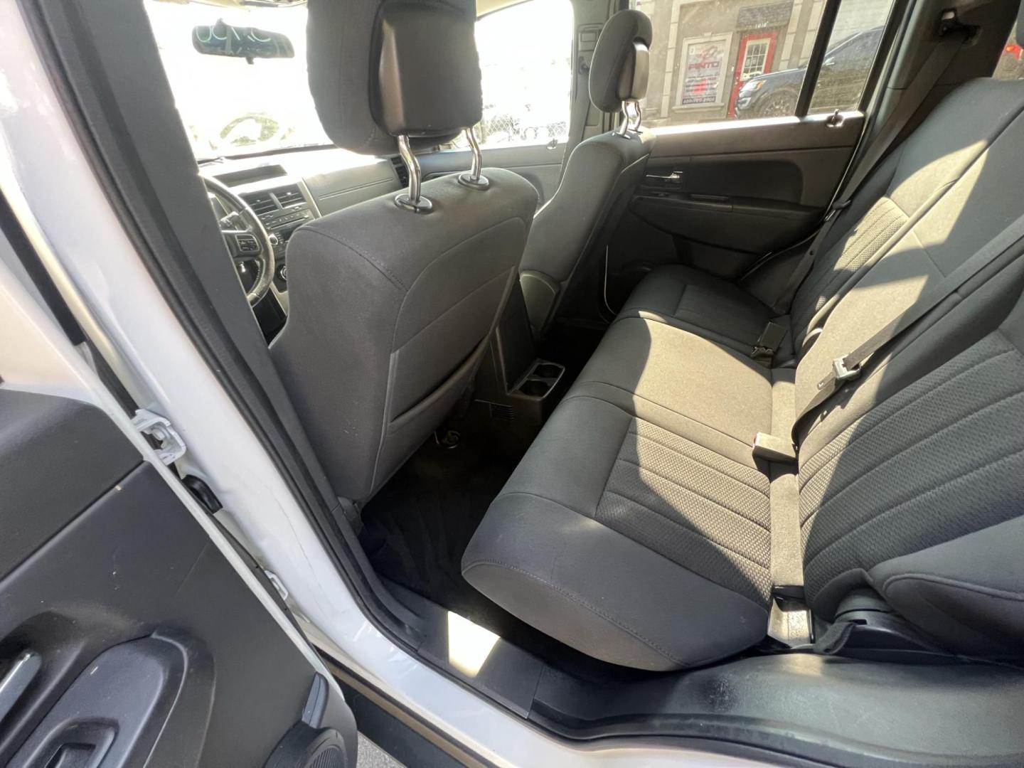 2011 White /Gray Jeep Liberty Sport 4WD (1J4PN2GK3BW) with an 3.7L V6 SOHC 12V engine, 4-Speed Automatic transmission, located at 1018 Brunswick Ave, Trenton, NJ, 08638, (609) 989-0900, 40.240086, -74.748085 - Photo#15