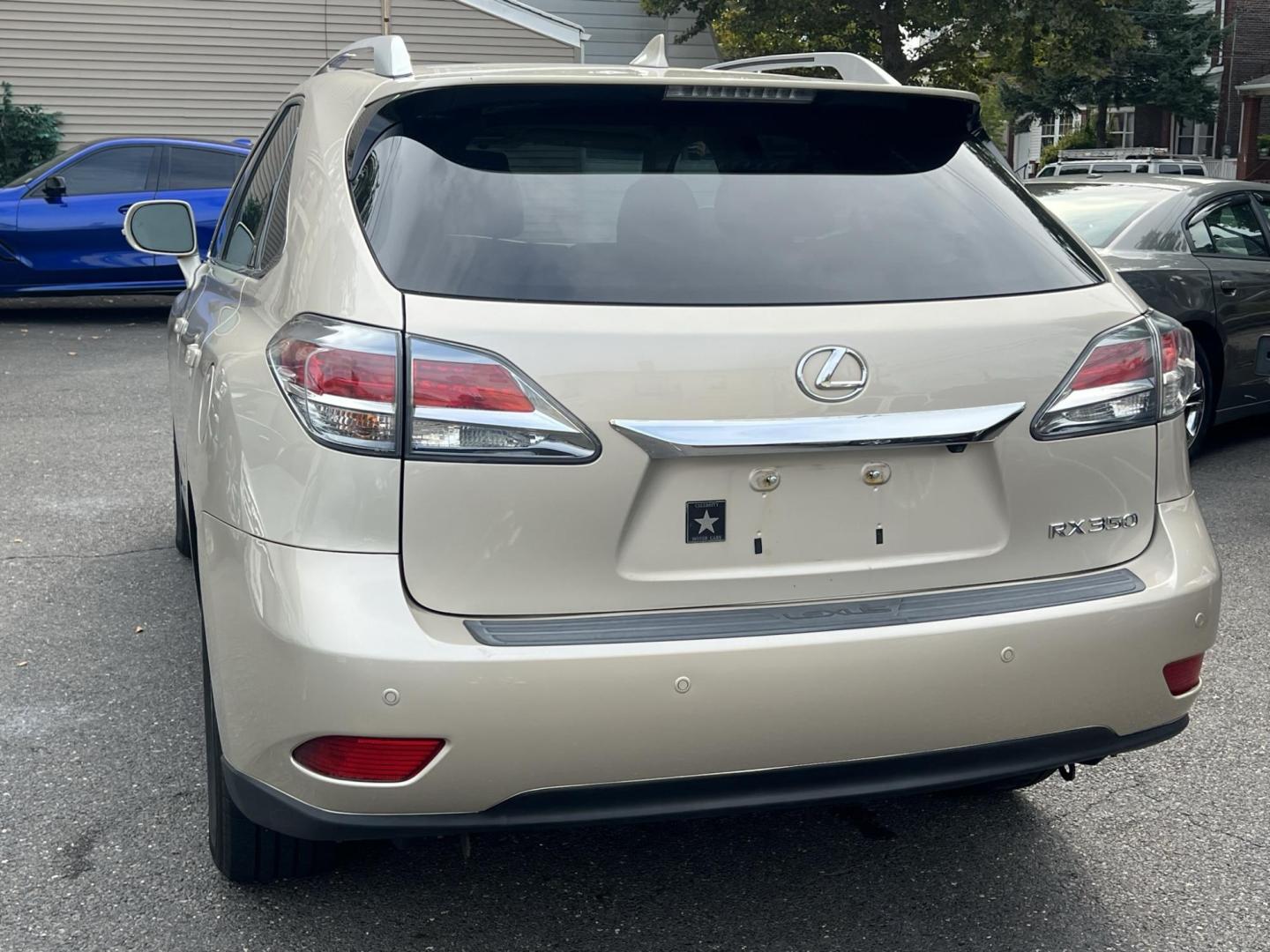 2014 Gold /Tan Leather Lexus RX 350 AWD (2T2BK1BA4EC) with an 3.5L V6 DOHC 24V engine, 5-Speed Automatic transmission, located at 1018 Brunswick Ave, Trenton, NJ, 08638, (609) 989-0900, 40.240086, -74.748085 - Photo#1