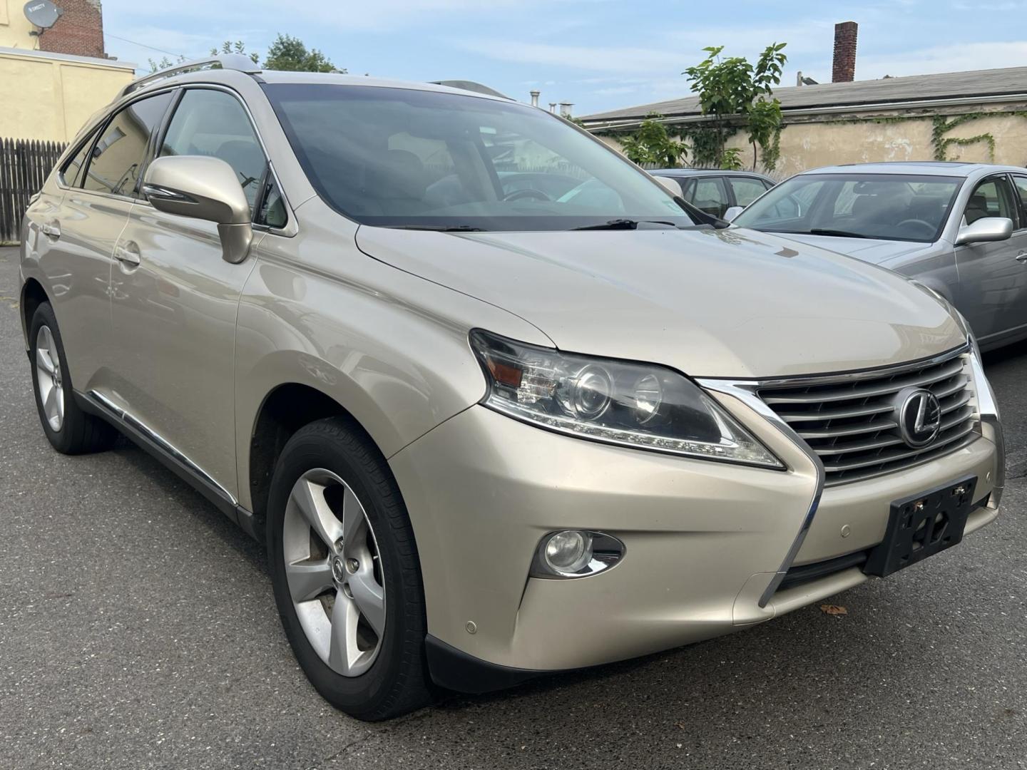 2014 Gold /Tan Leather Lexus RX 350 AWD (2T2BK1BA4EC) with an 3.5L V6 DOHC 24V engine, 5-Speed Automatic transmission, located at 1018 Brunswick Ave, Trenton, NJ, 08638, (609) 989-0900, 40.240086, -74.748085 - Photo#4