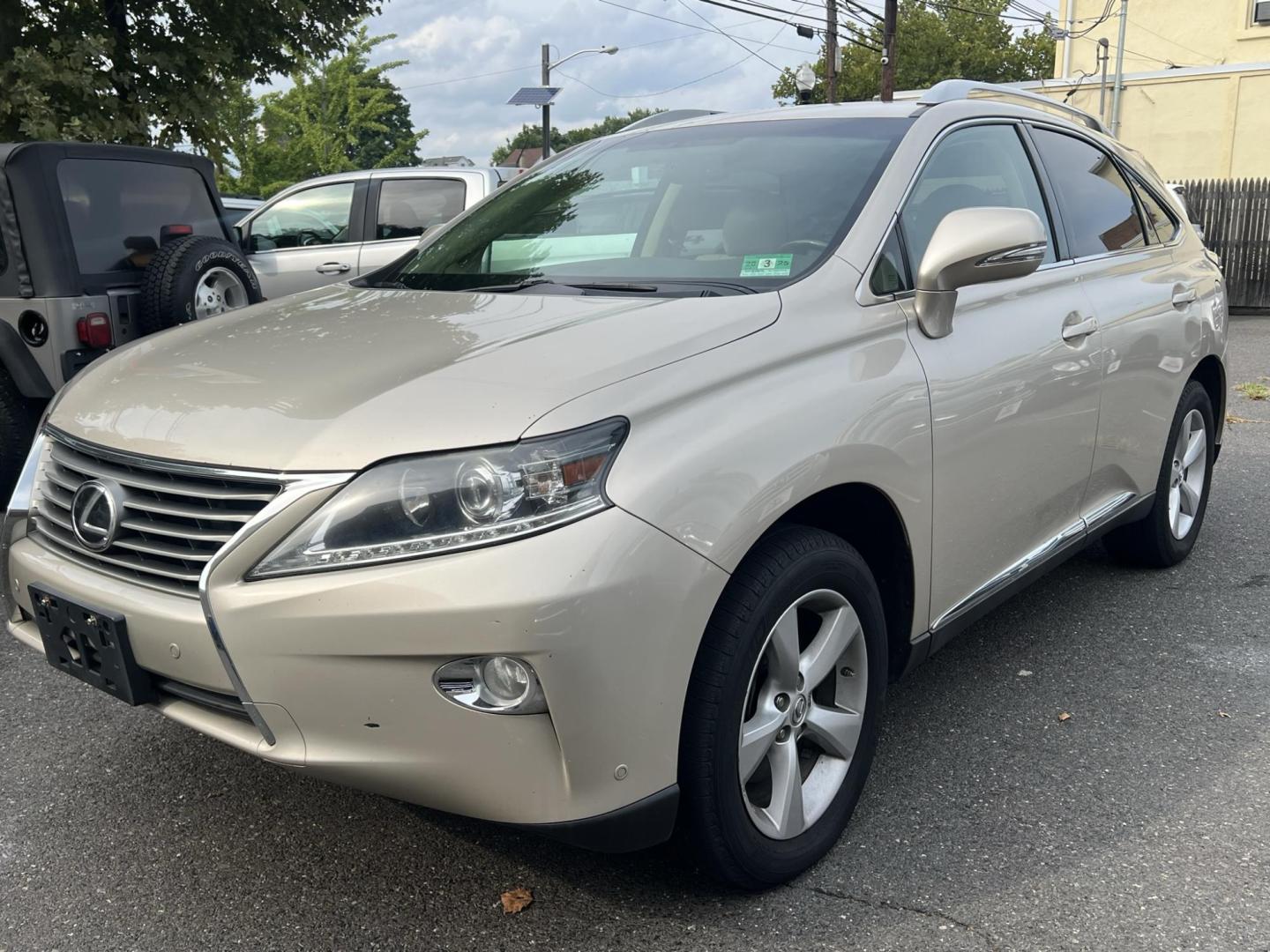 2014 Gold /Tan Leather Lexus RX 350 AWD (2T2BK1BA4EC) with an 3.5L V6 DOHC 24V engine, 5-Speed Automatic transmission, located at 1018 Brunswick Ave, Trenton, NJ, 08638, (609) 989-0900, 40.240086, -74.748085 - Photo#5