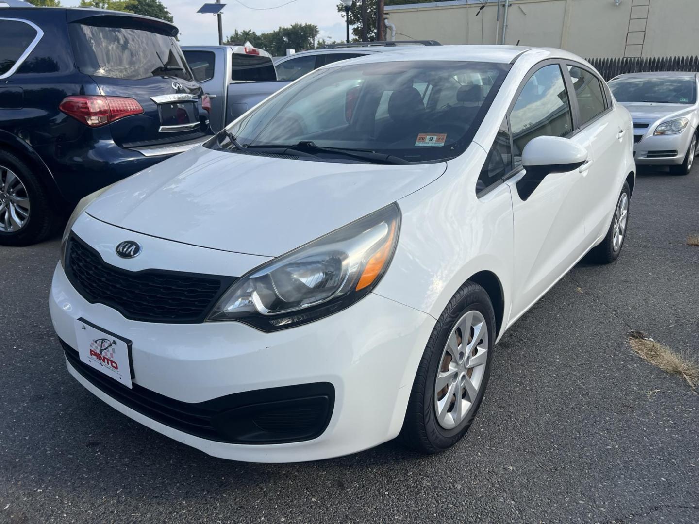 2013 White /Gray Kia Rio LX (KNADM4A35D6) with an 1.6L L4 DOHC 16V engine, located at 1018 Brunswick Ave, Trenton, NJ, 08638, (609) 989-0900, 40.240086, -74.748085 - Photo#2