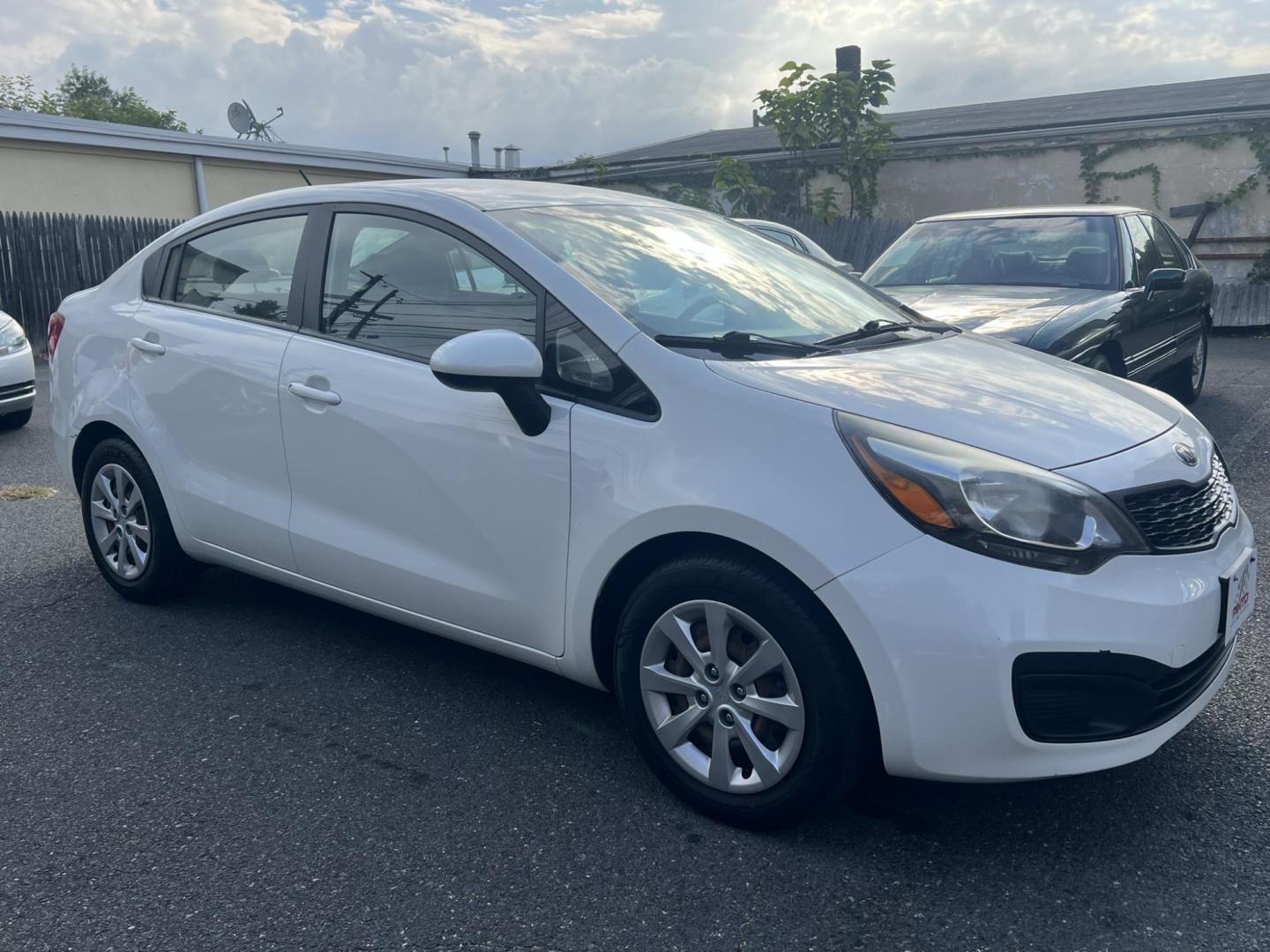 2013 White /Gray Kia Rio LX (KNADM4A35D6) with an 1.6L L4 DOHC 16V engine, located at 1018 Brunswick Ave, Trenton, NJ, 08638, (609) 989-0900, 40.240086, -74.748085 - Photo#0