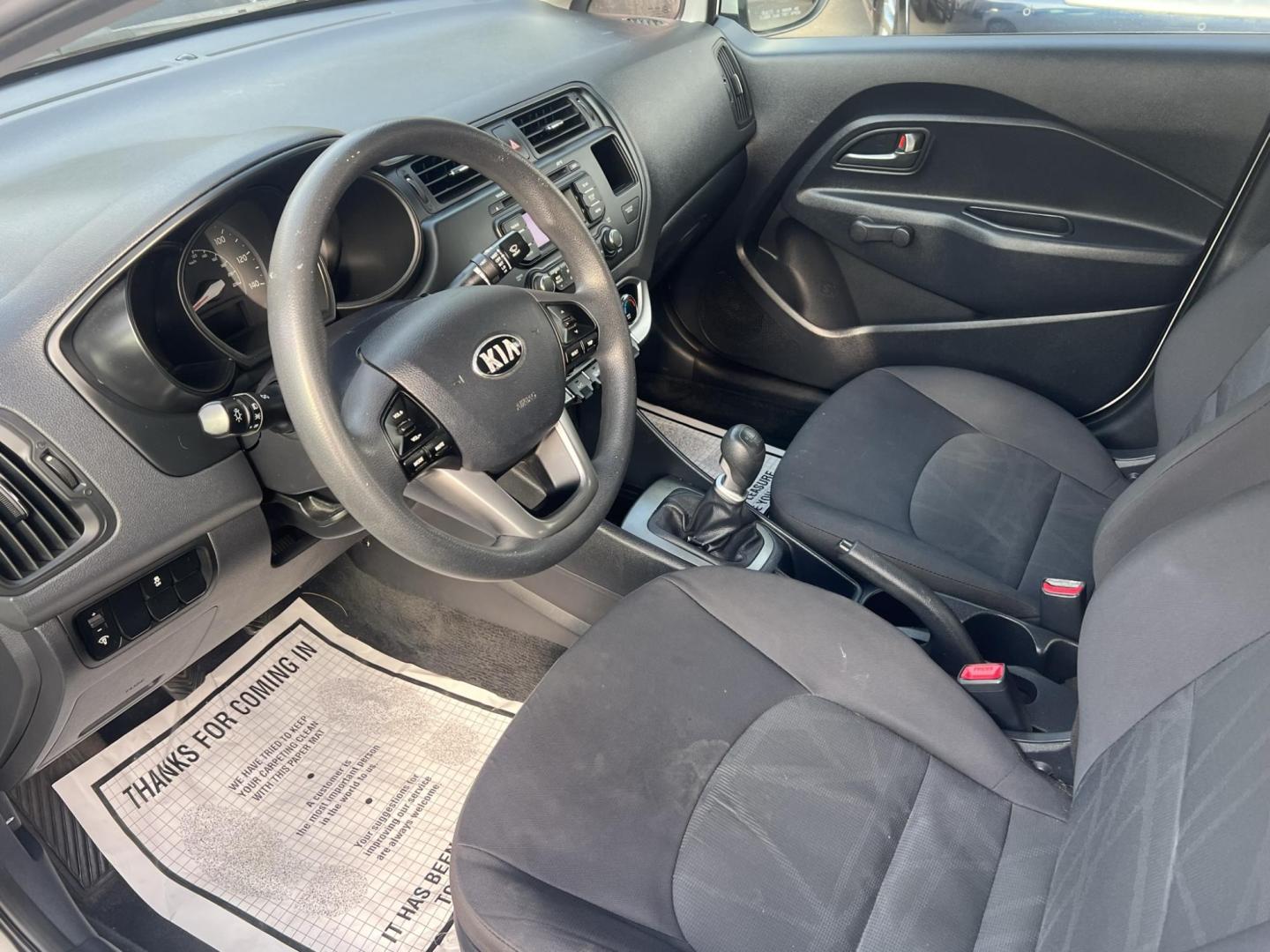 2013 White /Gray Kia Rio LX (KNADM4A35D6) with an 1.6L L4 DOHC 16V engine, located at 1018 Brunswick Ave, Trenton, NJ, 08638, (609) 989-0900, 40.240086, -74.748085 - Photo#5