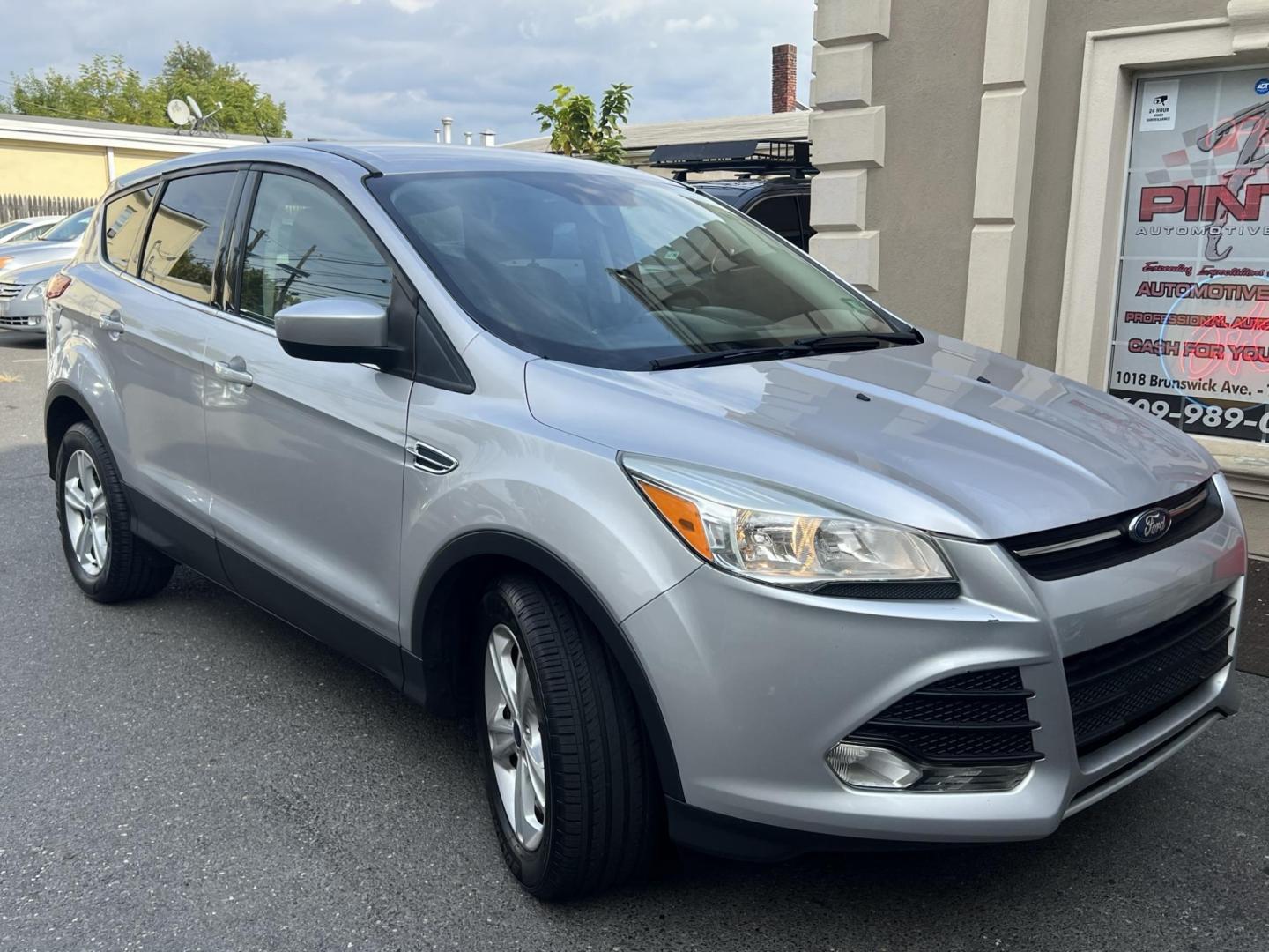 2016 SILVER /Gray Ford Escape SE FWD (1FMCU0G70GU) with an 2.5L L4 DOHC 16V engine, 6-Speed Automatic transmission, located at 1018 Brunswick Ave, Trenton, NJ, 08638, (609) 989-0900, 40.240086, -74.748085 - Photo#0