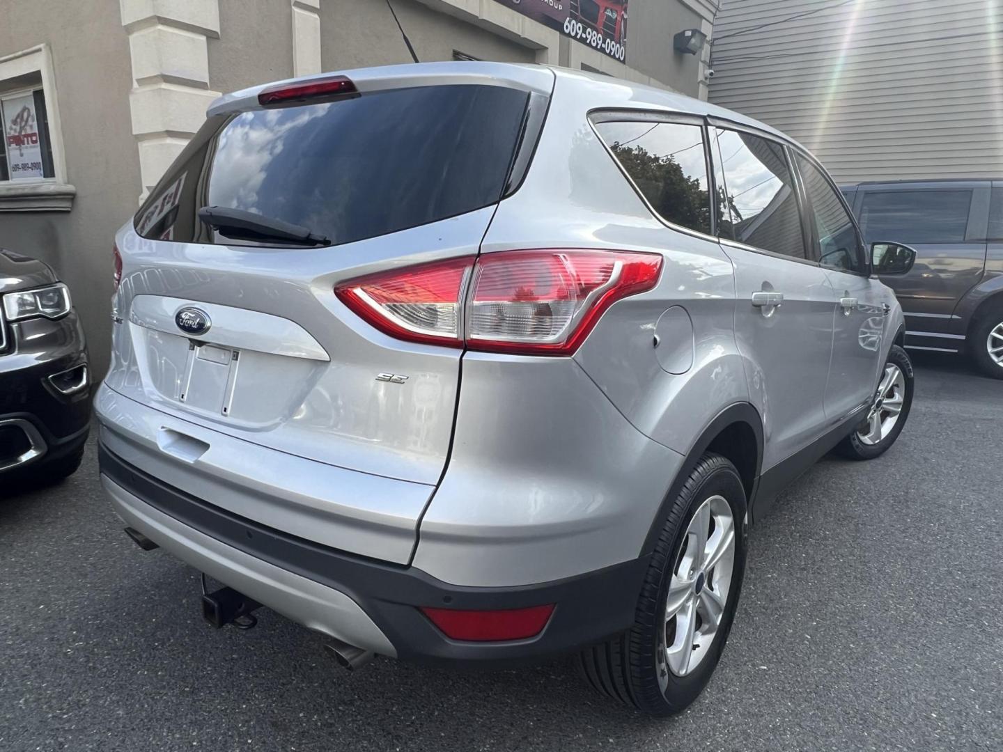 2016 SILVER /Gray Ford Escape SE FWD (1FMCU0G70GU) with an 2.5L L4 DOHC 16V engine, 6-Speed Automatic transmission, located at 1018 Brunswick Ave, Trenton, NJ, 08638, (609) 989-0900, 40.240086, -74.748085 - Photo#8