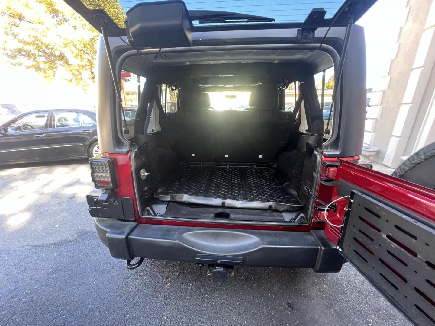 2013 Jeep Wrangler Unlimited Sport 4WD (1C4HJWDG2DL) with an 3.6L V6 DOHC 24V FFV engine, located at 1018 Brunswick Ave, Trenton, NJ, 08638, (609) 989-0900, 40.240086, -74.748085 - Photo#21