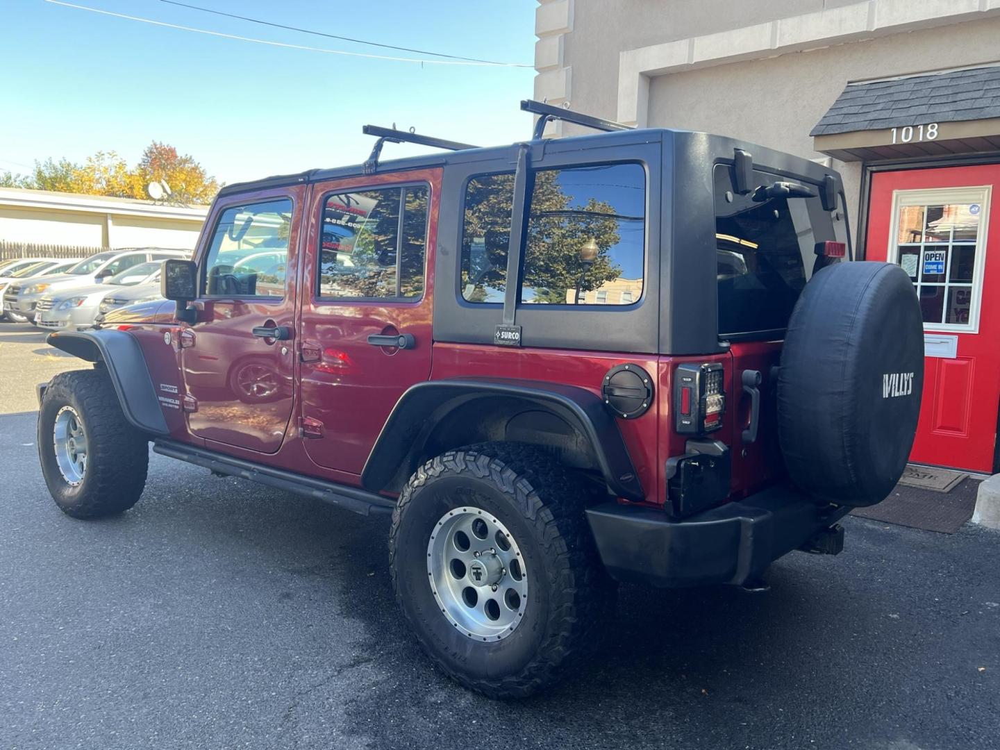 2013 Jeep Wrangler Unlimited Sport 4WD (1C4HJWDG2DL) with an 3.6L V6 DOHC 24V FFV engine, located at 1018 Brunswick Ave, Trenton, NJ, 08638, (609) 989-0900, 40.240086, -74.748085 - Photo#3