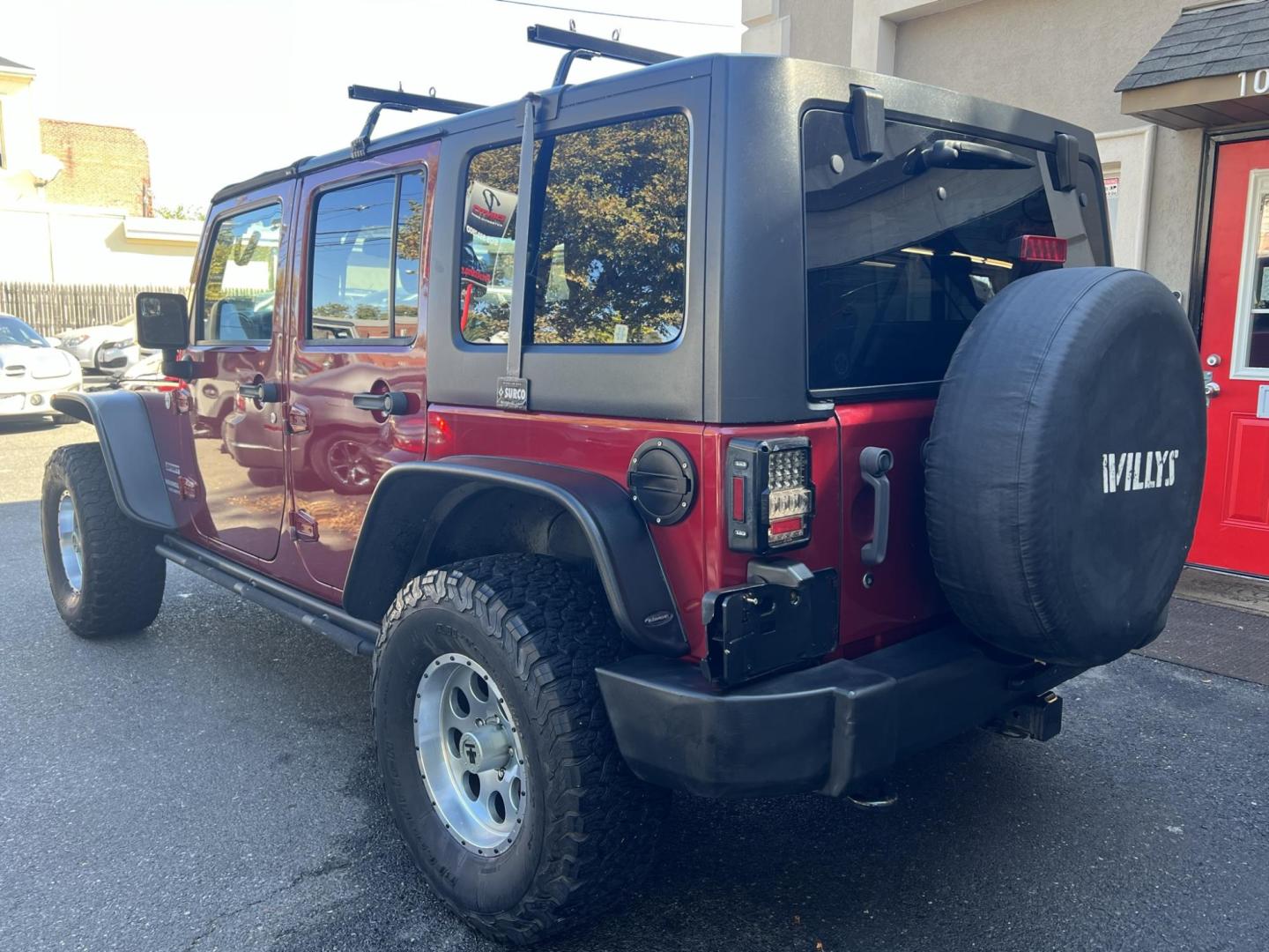 2013 Jeep Wrangler Unlimited Sport 4WD (1C4HJWDG2DL) with an 3.6L V6 DOHC 24V FFV engine, located at 1018 Brunswick Ave, Trenton, NJ, 08638, (609) 989-0900, 40.240086, -74.748085 - Photo#5