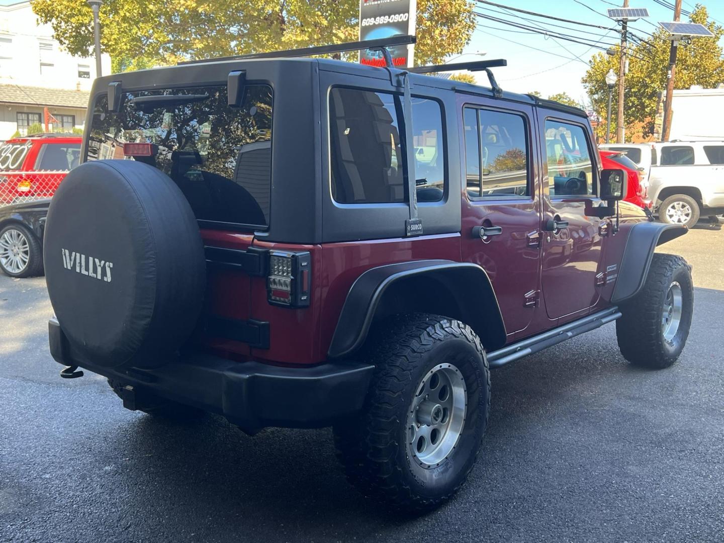 2013 Jeep Wrangler Unlimited Sport 4WD (1C4HJWDG2DL) with an 3.6L V6 DOHC 24V FFV engine, located at 1018 Brunswick Ave, Trenton, NJ, 08638, (609) 989-0900, 40.240086, -74.748085 - Photo#7