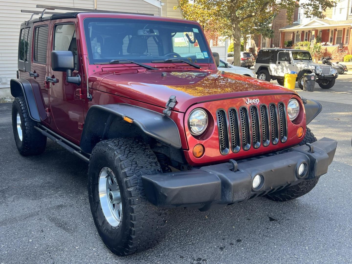 2013 Jeep Wrangler Unlimited Sport 4WD (1C4HJWDG2DL) with an 3.6L V6 DOHC 24V FFV engine, located at 1018 Brunswick Ave, Trenton, NJ, 08638, (609) 989-0900, 40.240086, -74.748085 - Photo#0