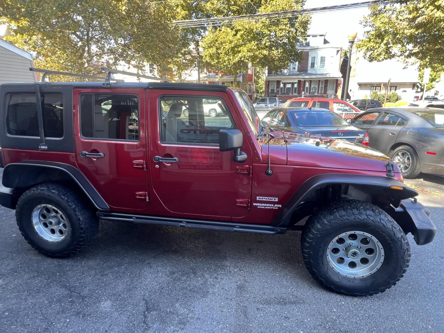 2013 Jeep Wrangler Unlimited Sport 4WD (1C4HJWDG2DL) with an 3.6L V6 DOHC 24V FFV engine, located at 1018 Brunswick Ave, Trenton, NJ, 08638, (609) 989-0900, 40.240086, -74.748085 - Photo#8