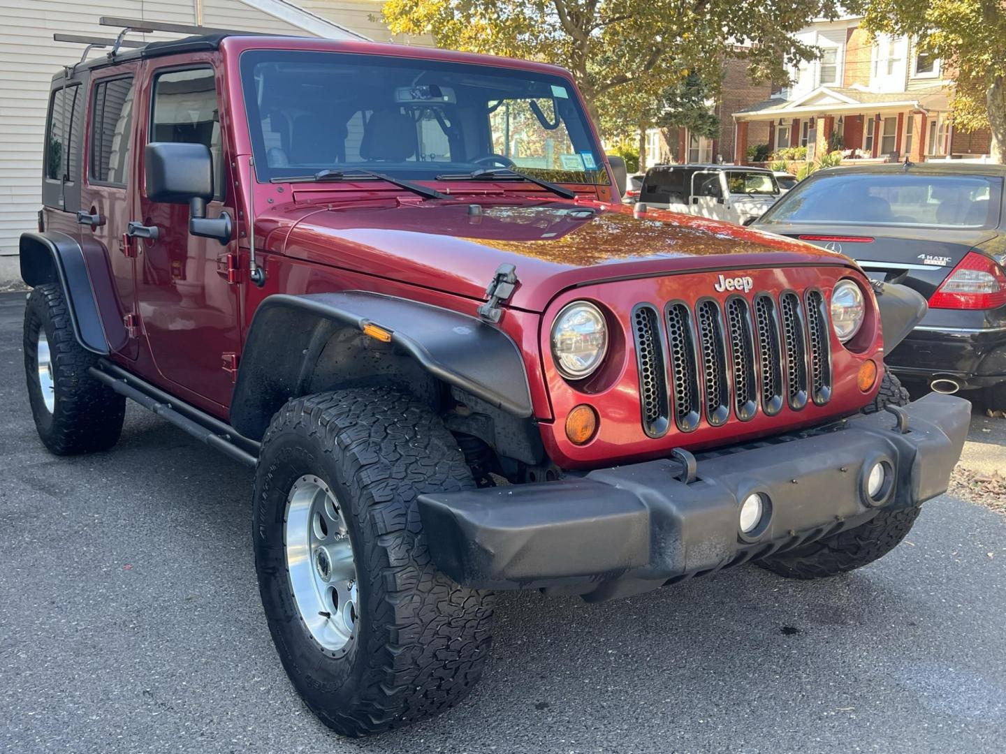 2013 Jeep Wrangler Unlimited Sport 4WD (1C4HJWDG2DL) with an 3.6L V6 DOHC 24V FFV engine, located at 1018 Brunswick Ave, Trenton, NJ, 08638, (609) 989-0900, 40.240086, -74.748085 - Photo#9