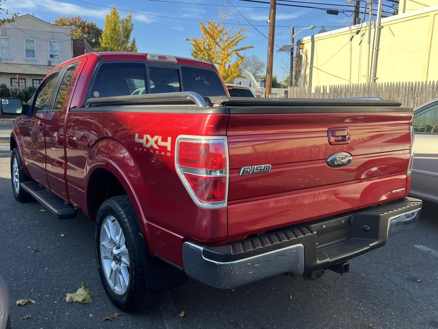 2011 Red /Tan Leather Ford F-150 FX4 SuperCab 6.5-ft. Bed 4WD (1FTFX1EF9BF) with an 5.0L V8 engine, 4-Speed Automatic transmission, located at 1018 Brunswick Ave, Trenton, NJ, 08638, (609) 989-0900, 40.240086, -74.748085 - Photo#5