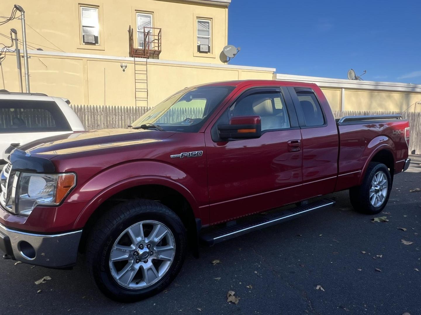 2011 Red /Tan Leather Ford F-150 FX4 SuperCab 6.5-ft. Bed 4WD (1FTFX1EF9BF) with an 5.0L V8 engine, 4-Speed Automatic transmission, located at 1018 Brunswick Ave, Trenton, NJ, 08638, (609) 989-0900, 40.240086, -74.748085 - Photo#2