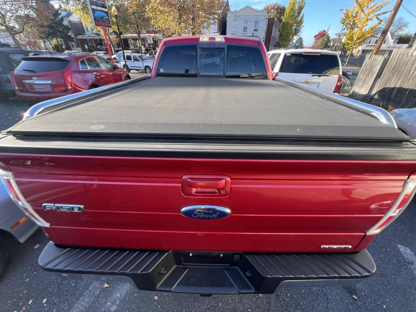 2011 Red /Tan Leather Ford F-150 FX4 SuperCab 6.5-ft. Bed 4WD (1FTFX1EF9BF) with an 5.0L V8 engine, 4-Speed Automatic transmission, located at 1018 Brunswick Ave, Trenton, NJ, 08638, (609) 989-0900, 40.240086, -74.748085 - Photo#6