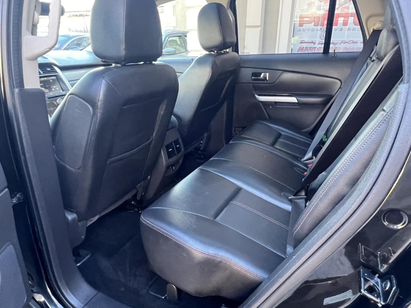 2014 BLACK /Black Leather Ford Edge SEL FWD (2FMDK3JC7EB) with an 3.5L V6 DOHC 24V engine, 6-Speed Automatic transmission, located at 1018 Brunswick Ave, Trenton, NJ, 08638, (609) 989-0900, 40.240086, -74.748085 - This Ford Edge is like new in every way! Fully serviced and ready for the road. Loaded up with Panoramic Roof,Rearview camera. Leather comfort package and Voice activated Navigation!! A must see and drive ASAP! Call Anthony to schedule a test drive, 609-273-5100 - Photo#13