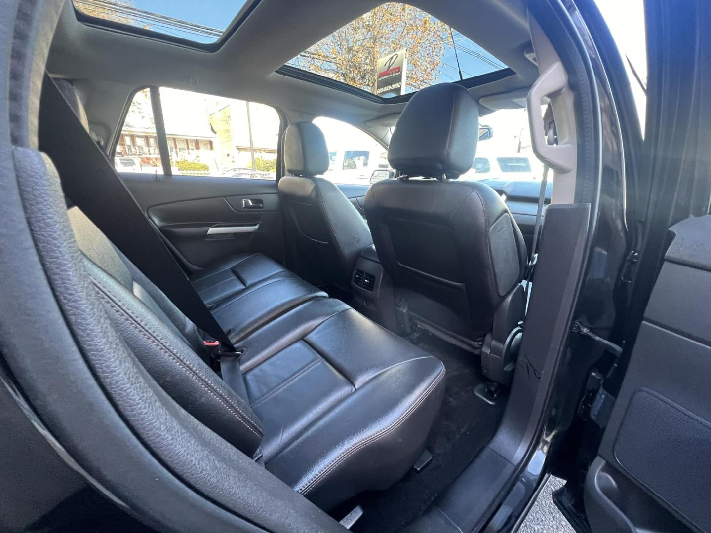 2014 BLACK /Black Leather Ford Edge SEL FWD (2FMDK3JC7EB) with an 3.5L V6 DOHC 24V engine, 6-Speed Automatic transmission, located at 1018 Brunswick Ave, Trenton, NJ, 08638, (609) 989-0900, 40.240086, -74.748085 - This Ford Edge is like new in every way! Fully serviced and ready for the road. Loaded up with Panoramic Roof,Rearview camera. Leather comfort package and Voice activated Navigation!! A must see and drive ASAP! Call Anthony to schedule a test drive, 609-273-5100 - Photo#24