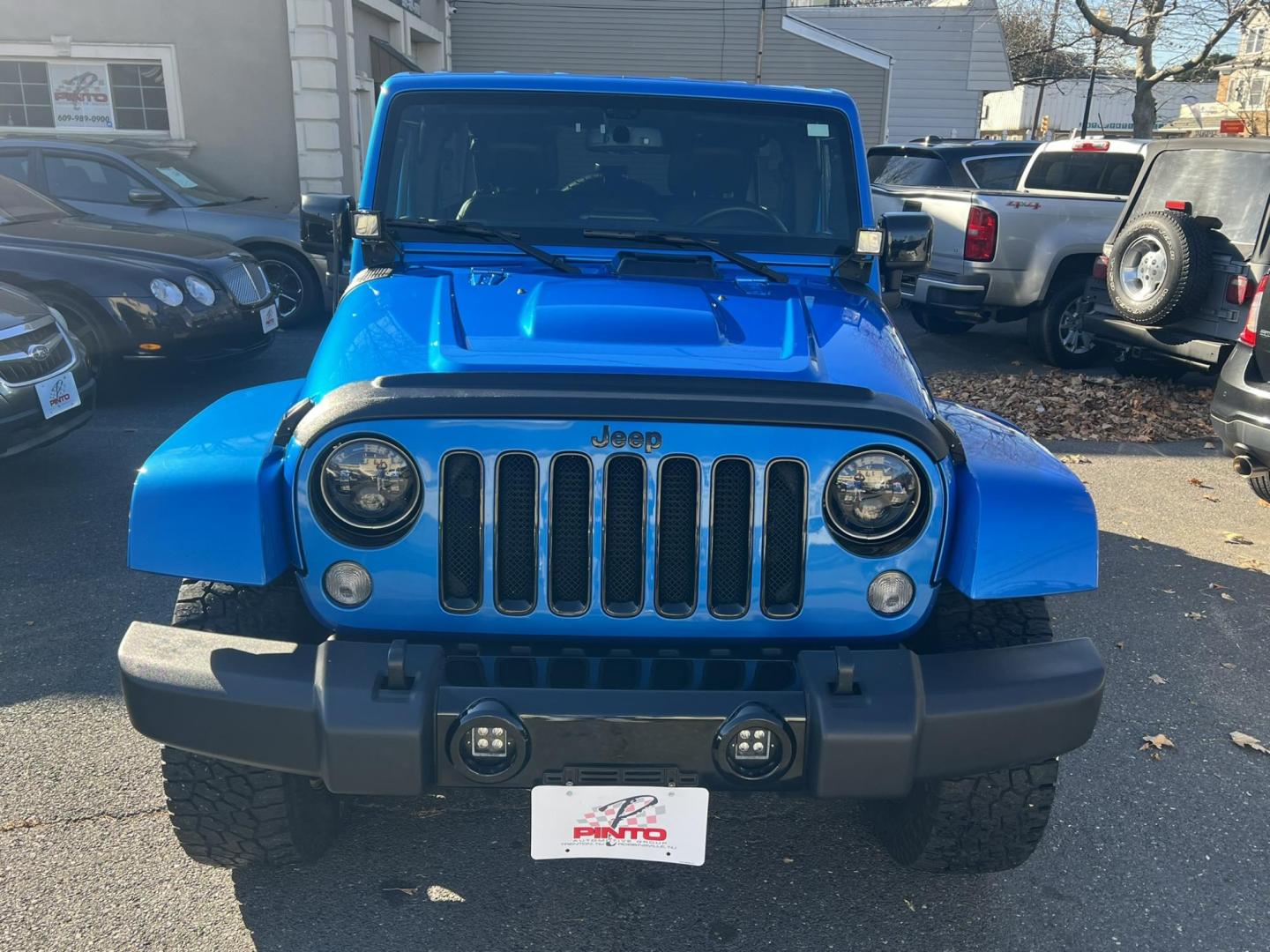 2015 Blue /Black Leather Jeep Wrangler Unlimited Sahara 4WD (1C4BJWEG7FL) with an 3.6L V6 DOHC 24V FFV engine, located at 1018 Brunswick Ave, Trenton, NJ, 08638, (609) 989-0900, 40.240086, -74.748085 - Photo#1