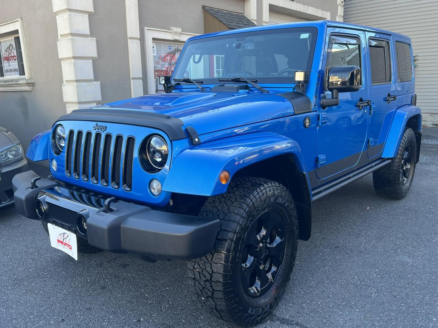 2015 Blue /Black Leather Jeep Wrangler Unlimited Sahara 4WD (1C4BJWEG7FL) with an 3.6L V6 DOHC 24V FFV engine, located at 1018 Brunswick Ave, Trenton, NJ, 08638, (609) 989-0900, 40.240086, -74.748085 - Photo#2