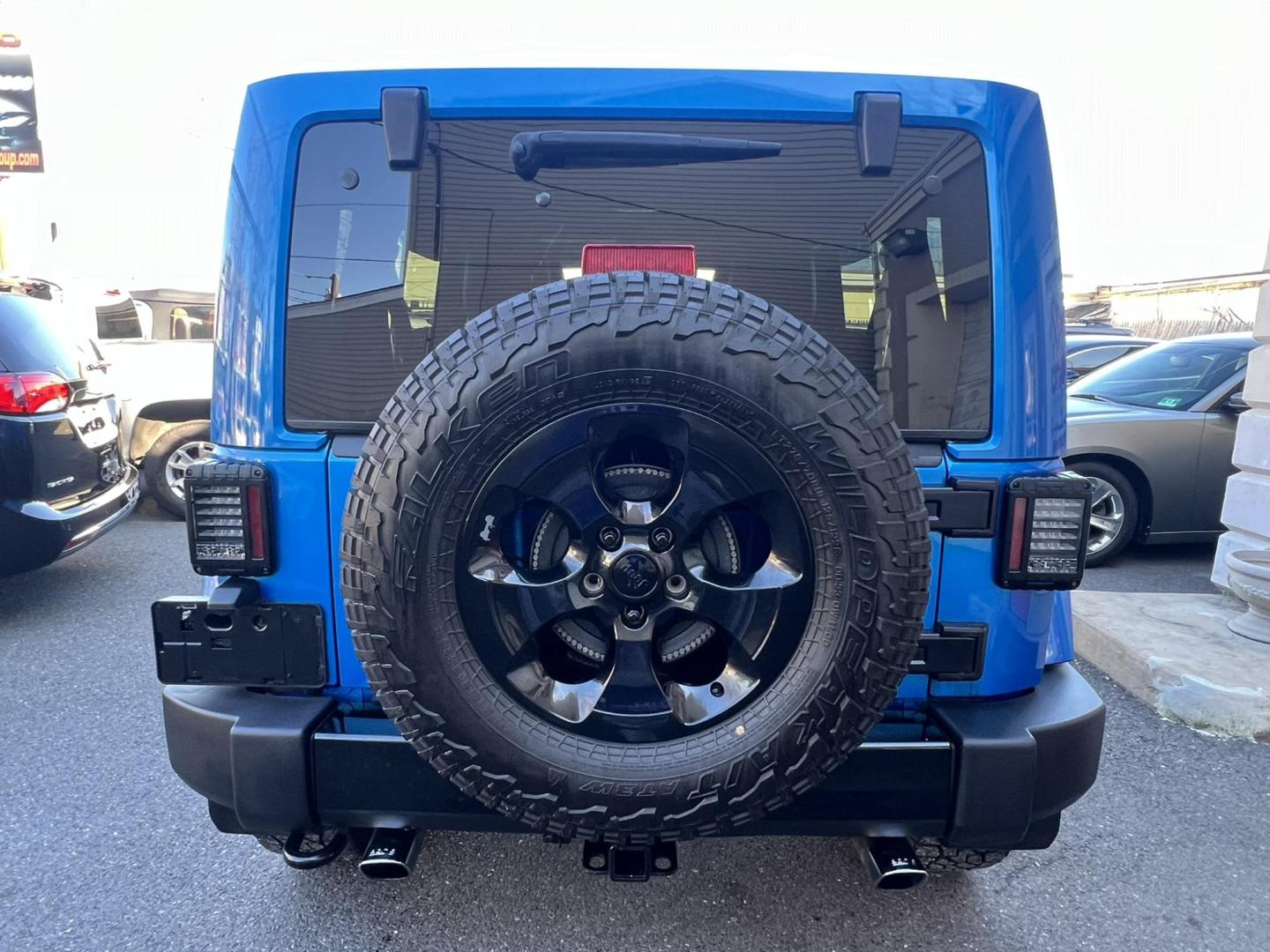 2015 Blue /Black Leather Jeep Wrangler Unlimited Sahara 4WD (1C4BJWEG7FL) with an 3.6L V6 DOHC 24V FFV engine, located at 1018 Brunswick Ave, Trenton, NJ, 08638, (609) 989-0900, 40.240086, -74.748085 - Photo#12