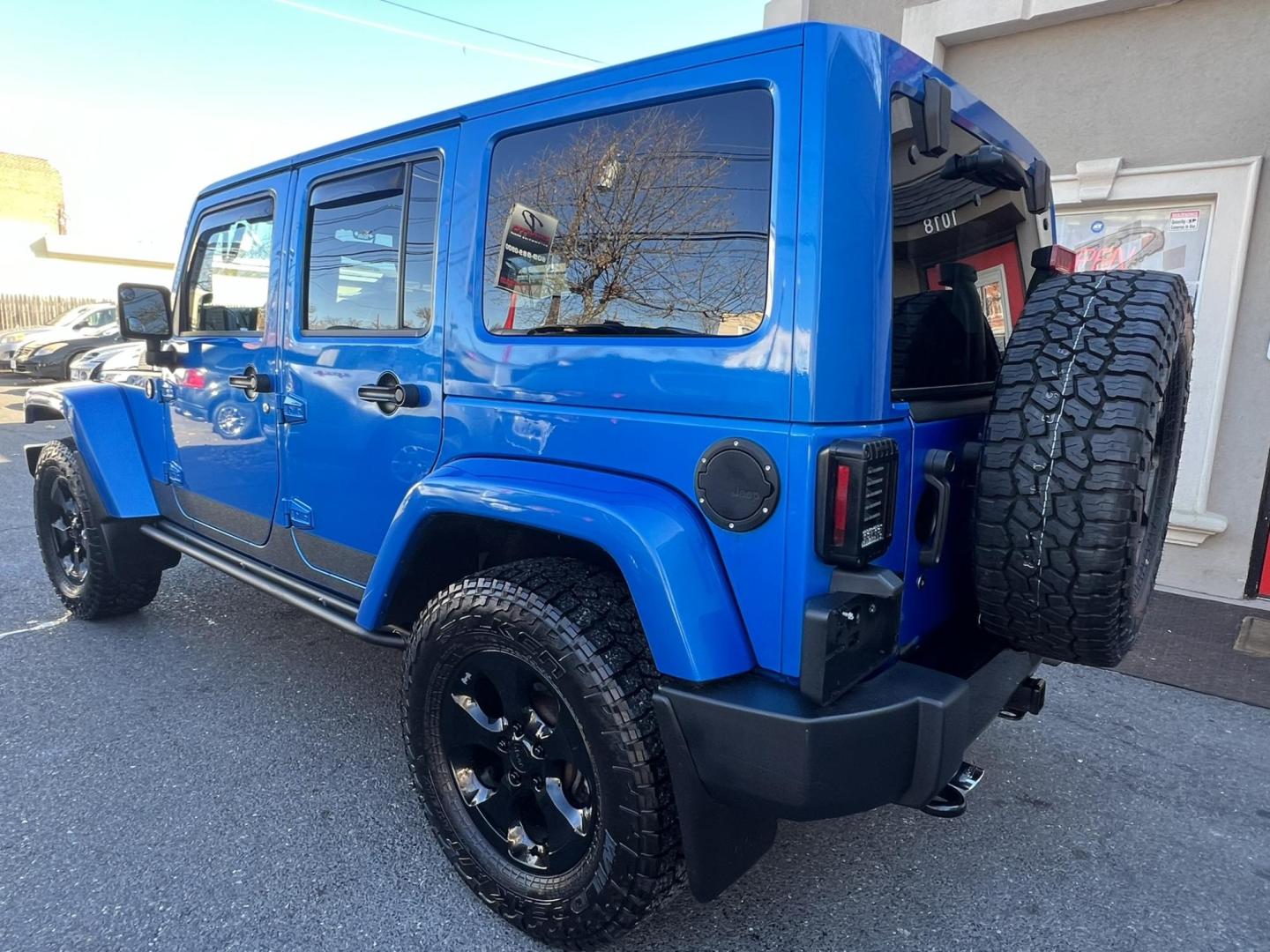 2015 Blue /Black Leather Jeep Wrangler Unlimited Sahara 4WD (1C4BJWEG7FL) with an 3.6L V6 DOHC 24V FFV engine, located at 1018 Brunswick Ave, Trenton, NJ, 08638, (609) 989-0900, 40.240086, -74.748085 - Photo#13