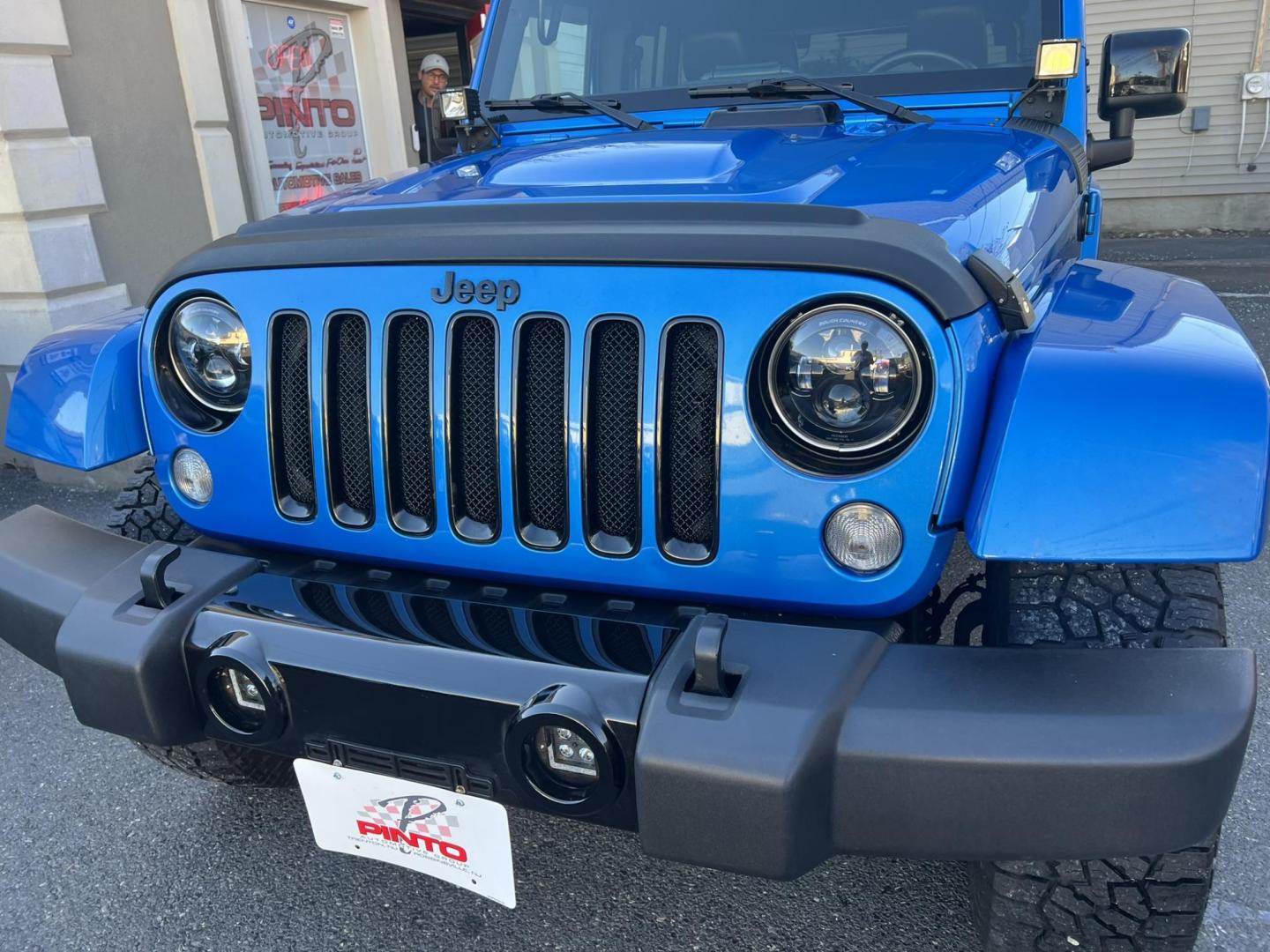 2015 Blue /Black Leather Jeep Wrangler Unlimited Sahara 4WD (1C4BJWEG7FL) with an 3.6L V6 DOHC 24V FFV engine, located at 1018 Brunswick Ave, Trenton, NJ, 08638, (609) 989-0900, 40.240086, -74.748085 - Photo#16