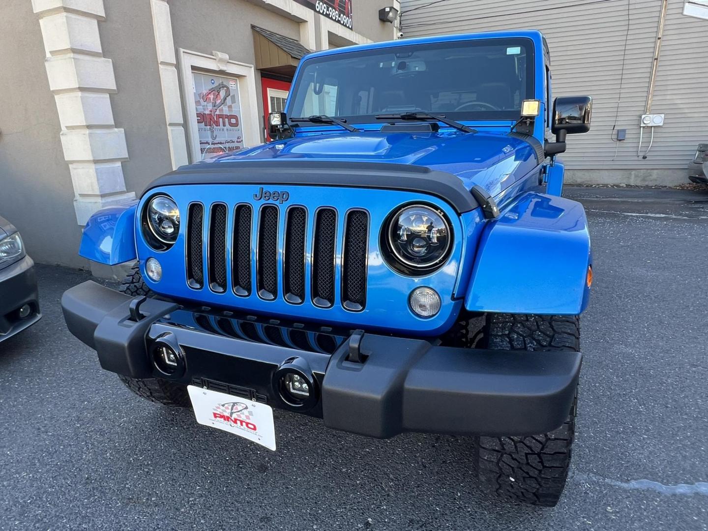 2015 Blue /Black Leather Jeep Wrangler Unlimited Sahara 4WD (1C4BJWEG7FL) with an 3.6L V6 DOHC 24V FFV engine, located at 1018 Brunswick Ave, Trenton, NJ, 08638, (609) 989-0900, 40.240086, -74.748085 - Photo#17