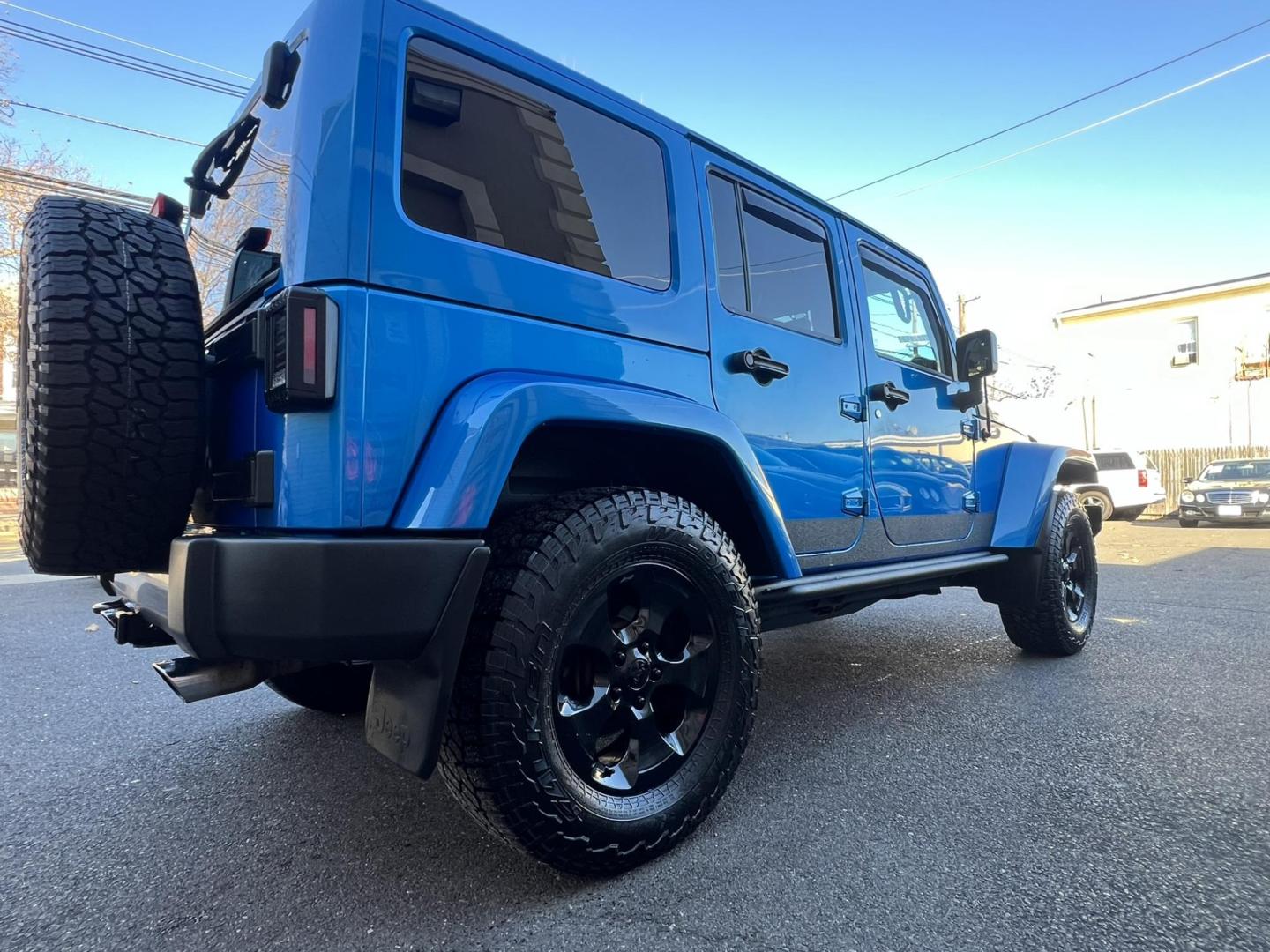 2015 Blue /Black Leather Jeep Wrangler Unlimited Sahara 4WD (1C4BJWEG7FL) with an 3.6L V6 DOHC 24V FFV engine, located at 1018 Brunswick Ave, Trenton, NJ, 08638, (609) 989-0900, 40.240086, -74.748085 - Photo#20