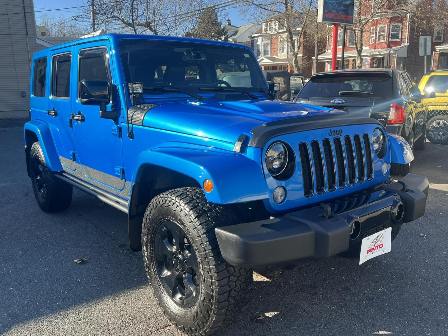 2015 Blue /Black Leather Jeep Wrangler Unlimited Sahara 4WD (1C4BJWEG7FL) with an 3.6L V6 DOHC 24V FFV engine, located at 1018 Brunswick Ave, Trenton, NJ, 08638, (609) 989-0900, 40.240086, -74.748085 - Photo#0