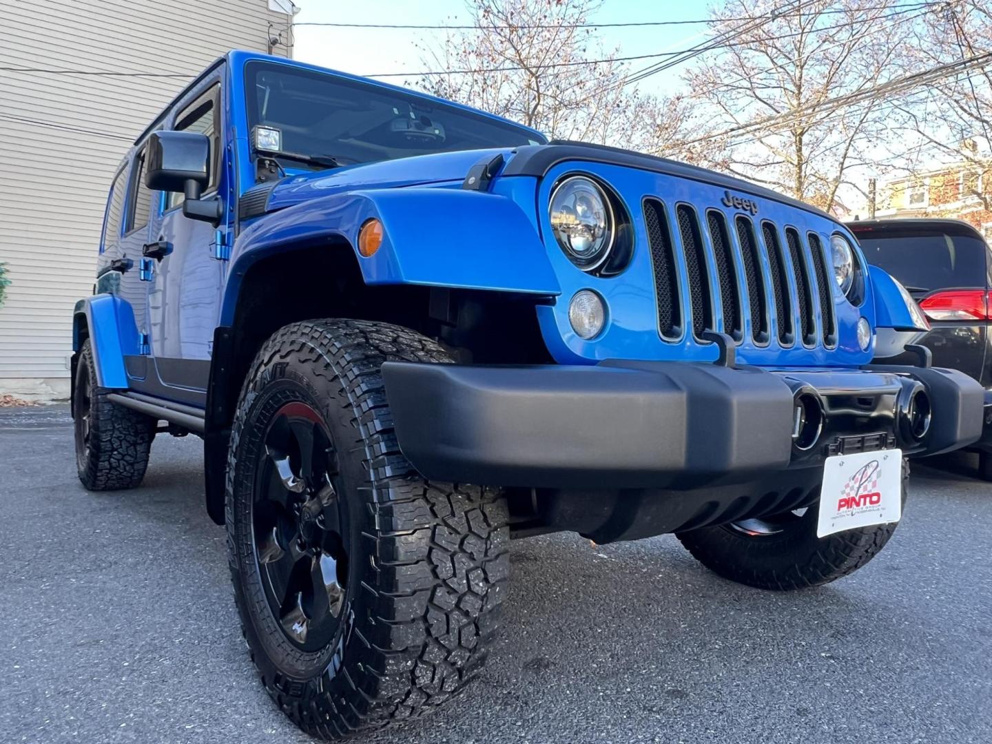 2015 Blue /Black Leather Jeep Wrangler Unlimited Sahara 4WD (1C4BJWEG7FL) with an 3.6L V6 DOHC 24V FFV engine, located at 1018 Brunswick Ave, Trenton, NJ, 08638, (609) 989-0900, 40.240086, -74.748085 - Photo#21