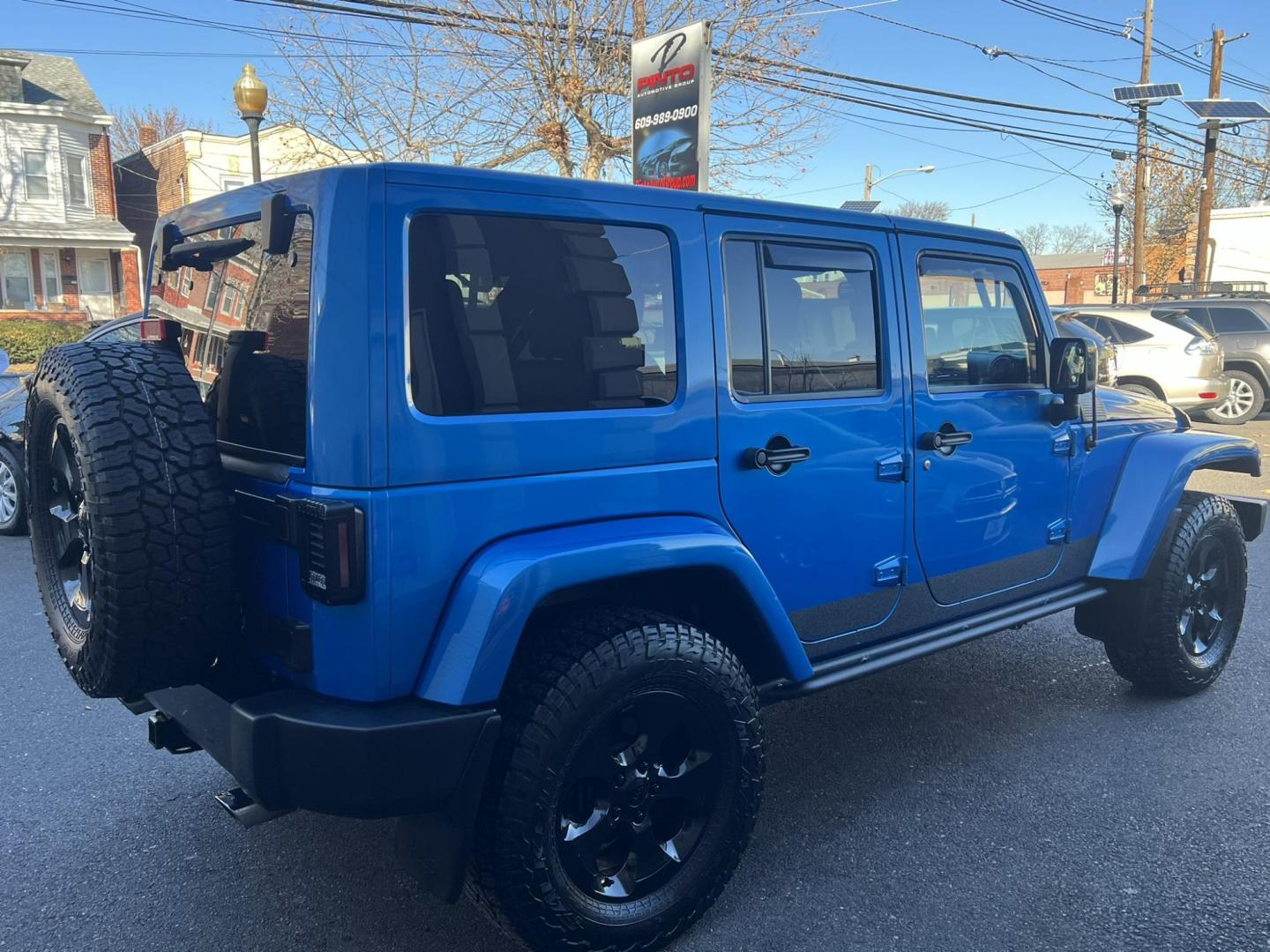 2015 Blue /Black Leather Jeep Wrangler Unlimited Sahara 4WD (1C4BJWEG7FL) with an 3.6L V6 DOHC 24V FFV engine, located at 1018 Brunswick Ave, Trenton, NJ, 08638, (609) 989-0900, 40.240086, -74.748085 - Photo#22