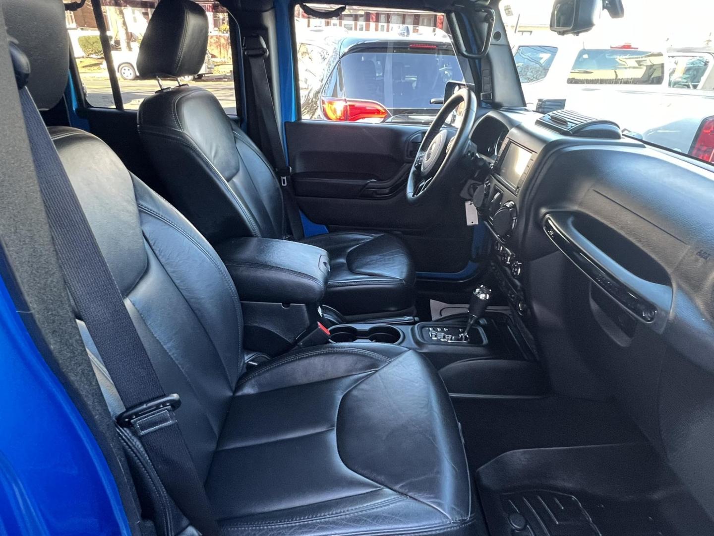 2015 Blue /Black Leather Jeep Wrangler Unlimited Sahara 4WD (1C4BJWEG7FL) with an 3.6L V6 DOHC 24V FFV engine, located at 1018 Brunswick Ave, Trenton, NJ, 08638, (609) 989-0900, 40.240086, -74.748085 - Photo#23