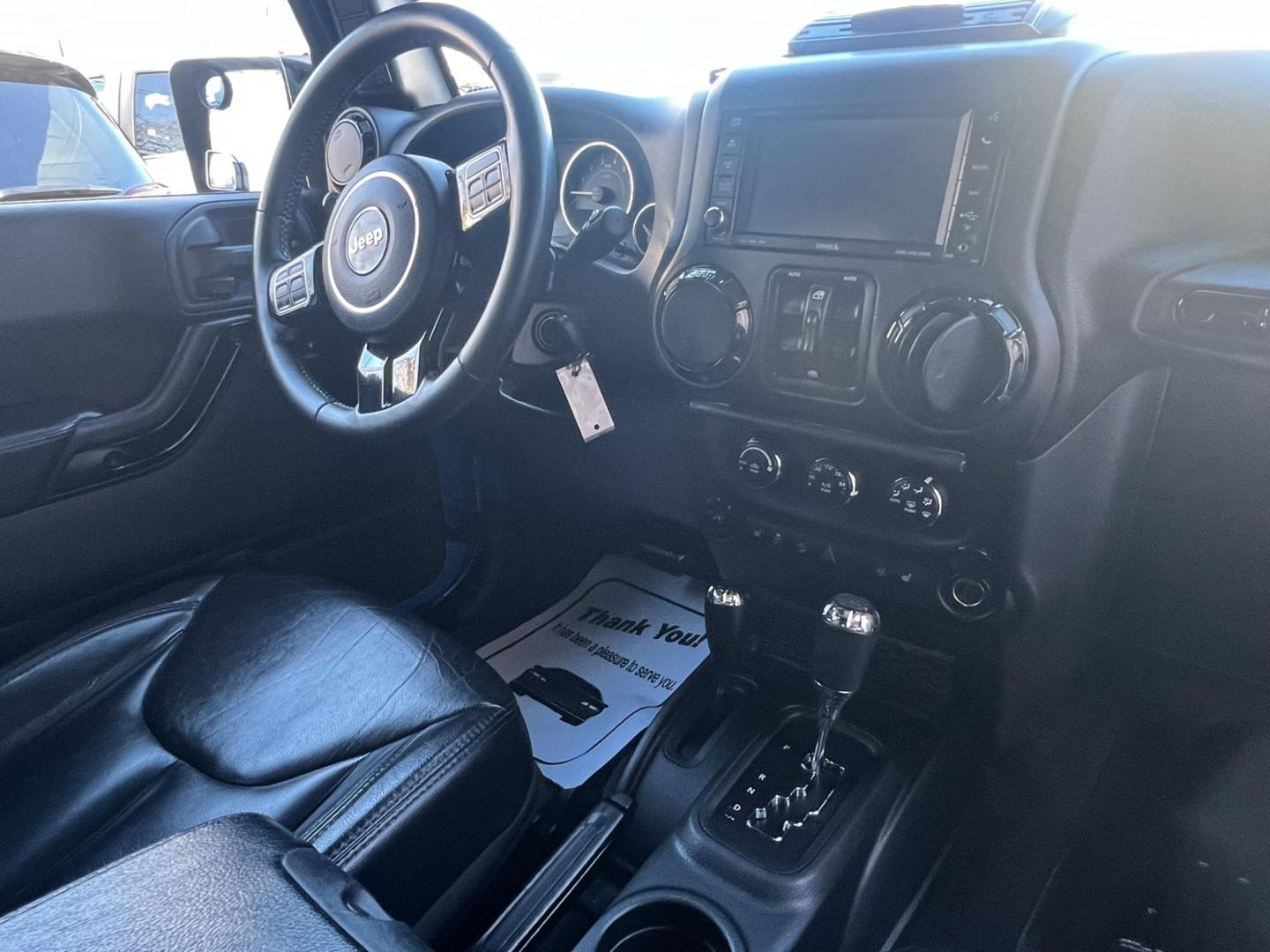 2015 Blue /Black Leather Jeep Wrangler Unlimited Sahara 4WD (1C4BJWEG7FL) with an 3.6L V6 DOHC 24V FFV engine, located at 1018 Brunswick Ave, Trenton, NJ, 08638, (609) 989-0900, 40.240086, -74.748085 - Photo#26