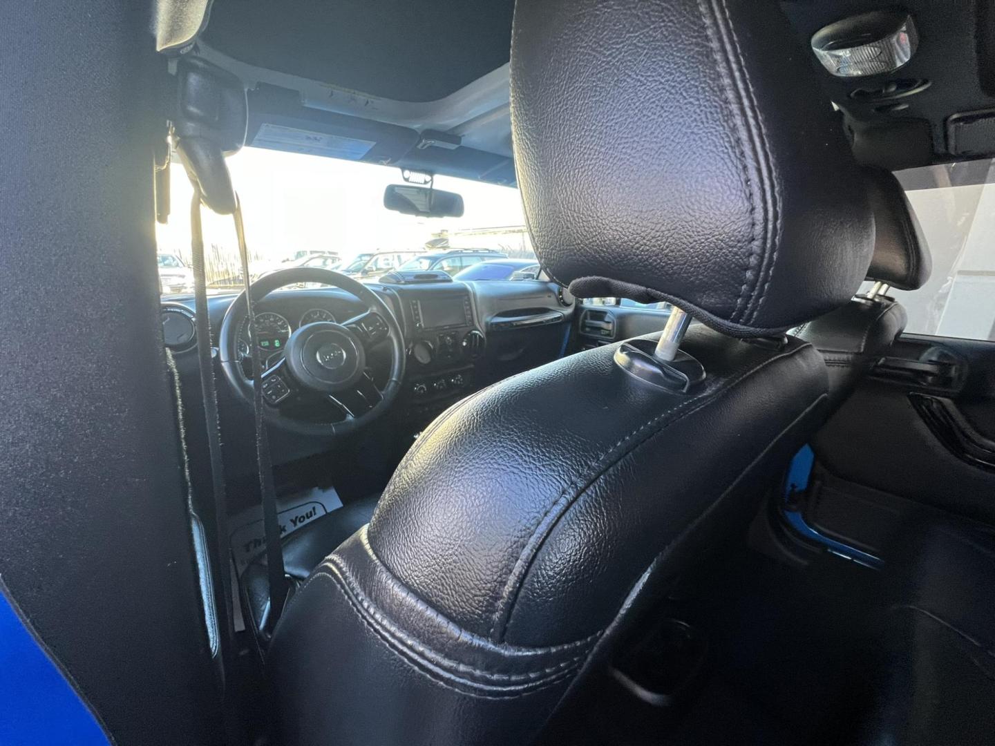 2015 Blue /Black Leather Jeep Wrangler Unlimited Sahara 4WD (1C4BJWEG7FL) with an 3.6L V6 DOHC 24V FFV engine, located at 1018 Brunswick Ave, Trenton, NJ, 08638, (609) 989-0900, 40.240086, -74.748085 - Photo#31