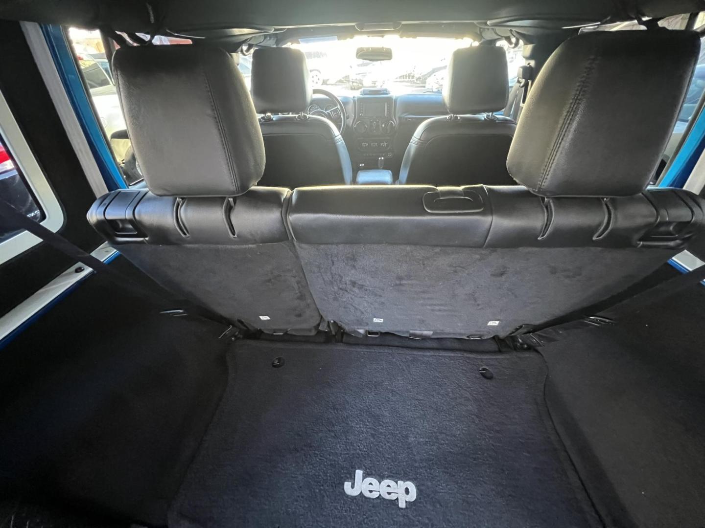 2015 Blue /Black Leather Jeep Wrangler Unlimited Sahara 4WD (1C4BJWEG7FL) with an 3.6L V6 DOHC 24V FFV engine, located at 1018 Brunswick Ave, Trenton, NJ, 08638, (609) 989-0900, 40.240086, -74.748085 - Photo#34