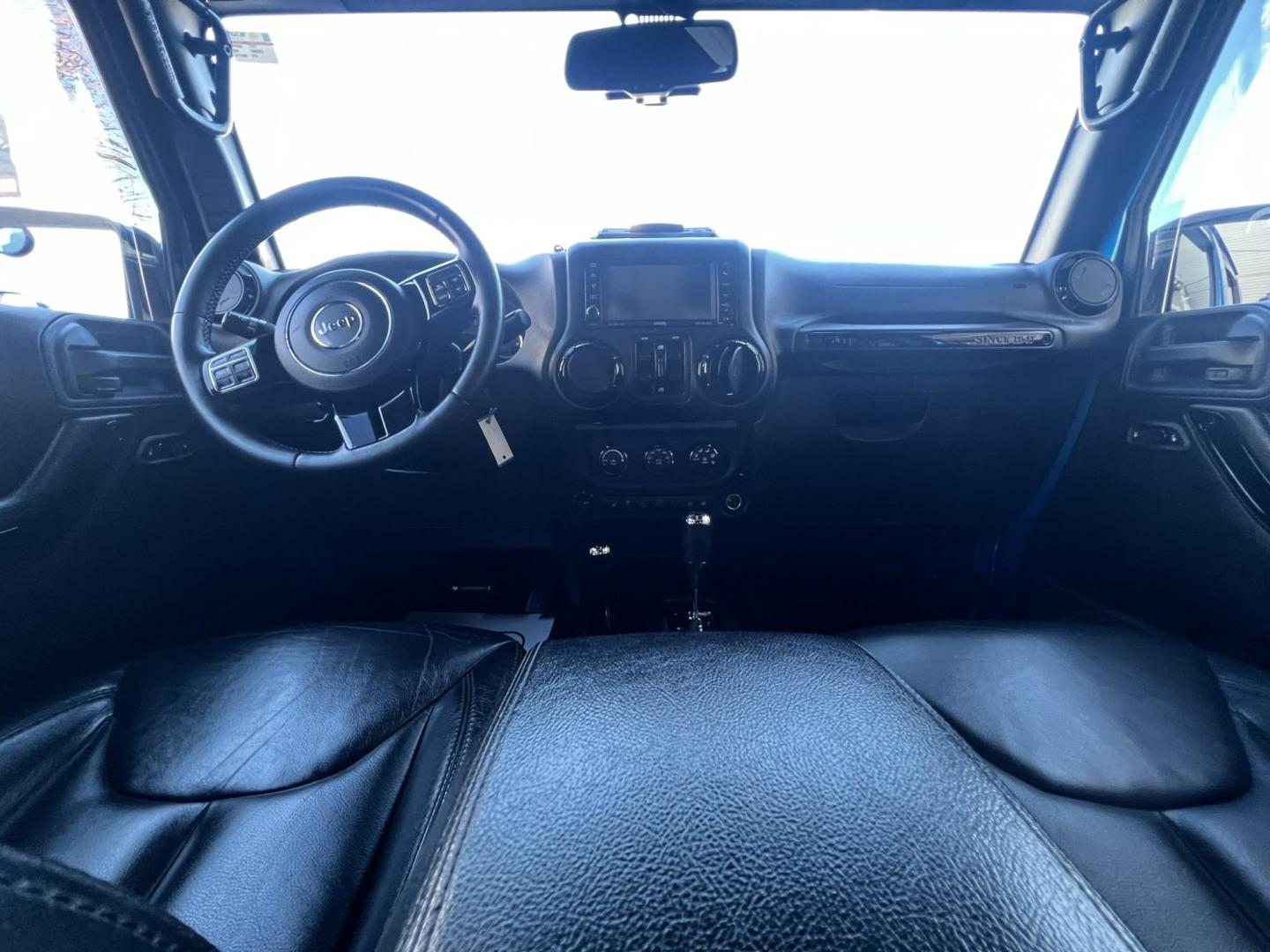 2015 Blue /Black Leather Jeep Wrangler Unlimited Sahara 4WD (1C4BJWEG7FL) with an 3.6L V6 DOHC 24V FFV engine, located at 1018 Brunswick Ave, Trenton, NJ, 08638, (609) 989-0900, 40.240086, -74.748085 - Photo#41