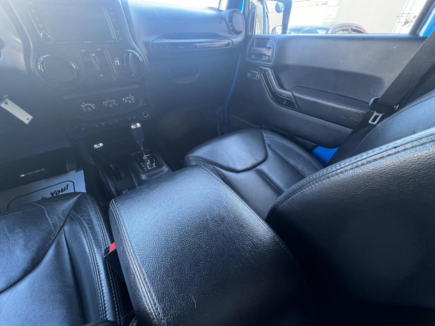 2015 Blue /Black Leather Jeep Wrangler Unlimited Sahara 4WD (1C4BJWEG7FL) with an 3.6L V6 DOHC 24V FFV engine, located at 1018 Brunswick Ave, Trenton, NJ, 08638, (609) 989-0900, 40.240086, -74.748085 - Photo#42