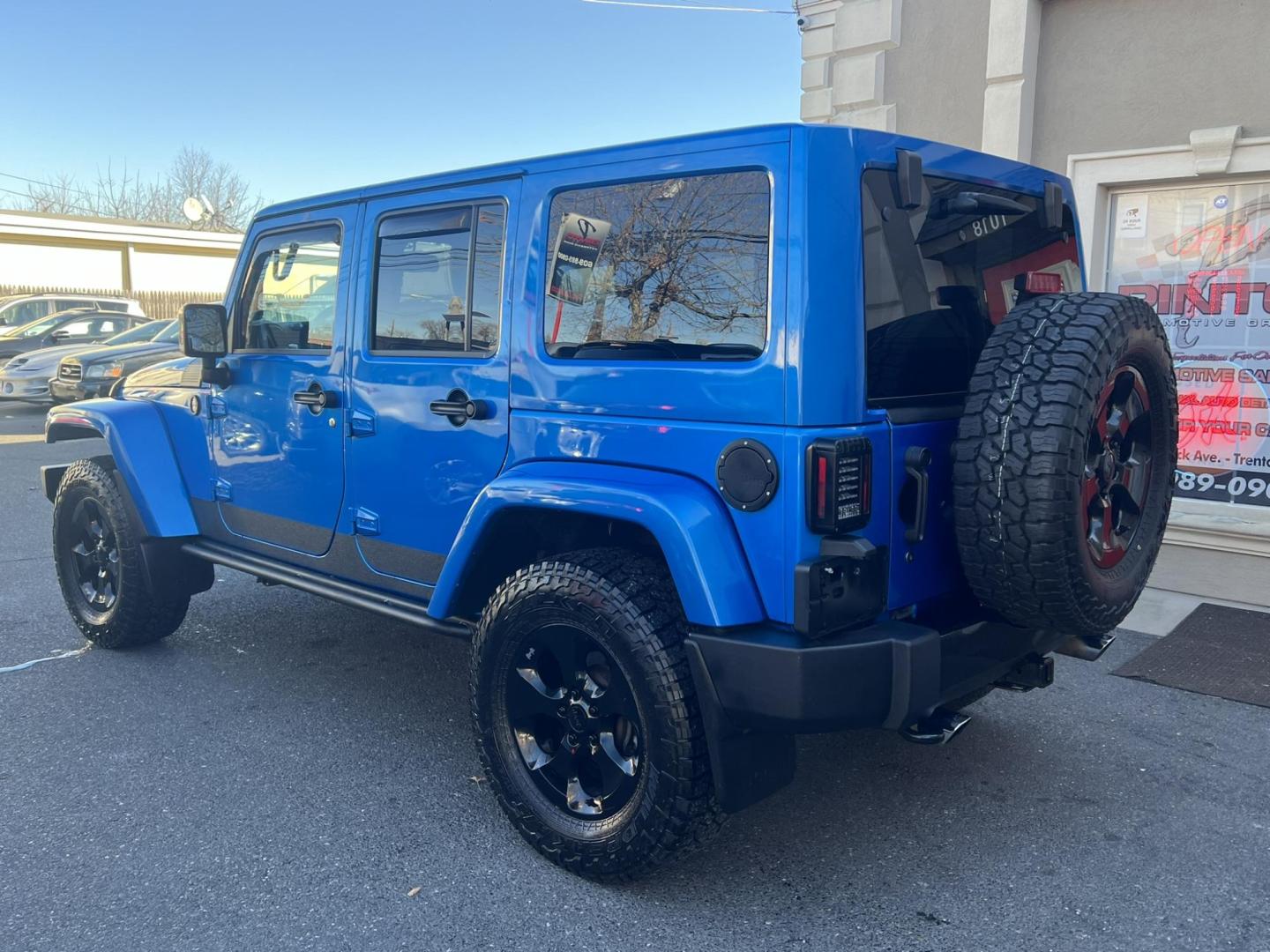 2015 Blue /Black Leather Jeep Wrangler Unlimited Sahara 4WD (1C4BJWEG7FL) with an 3.6L V6 DOHC 24V FFV engine, located at 1018 Brunswick Ave, Trenton, NJ, 08638, (609) 989-0900, 40.240086, -74.748085 - Photo#6