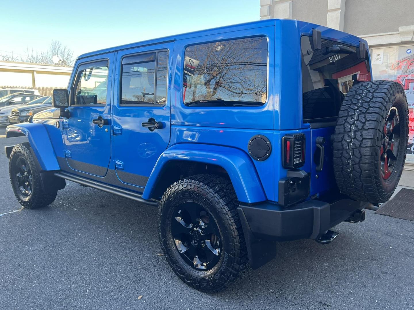 2015 Blue /Black Leather Jeep Wrangler Unlimited Sahara 4WD (1C4BJWEG7FL) with an 3.6L V6 DOHC 24V FFV engine, located at 1018 Brunswick Ave, Trenton, NJ, 08638, (609) 989-0900, 40.240086, -74.748085 - Photo#10