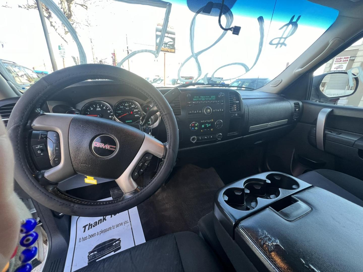 2010 White /Black GMC Sierra 1500 SLE Ext. Cab 4WD (1GTSKVE35AZ) with an 5.3L V8 OHV 16V FFV engine, 4-Speed Automatic transmission, located at 1018 Brunswick Ave, Trenton, NJ, 08638, (609) 989-0900, 40.240086, -74.748085 - Photo#6